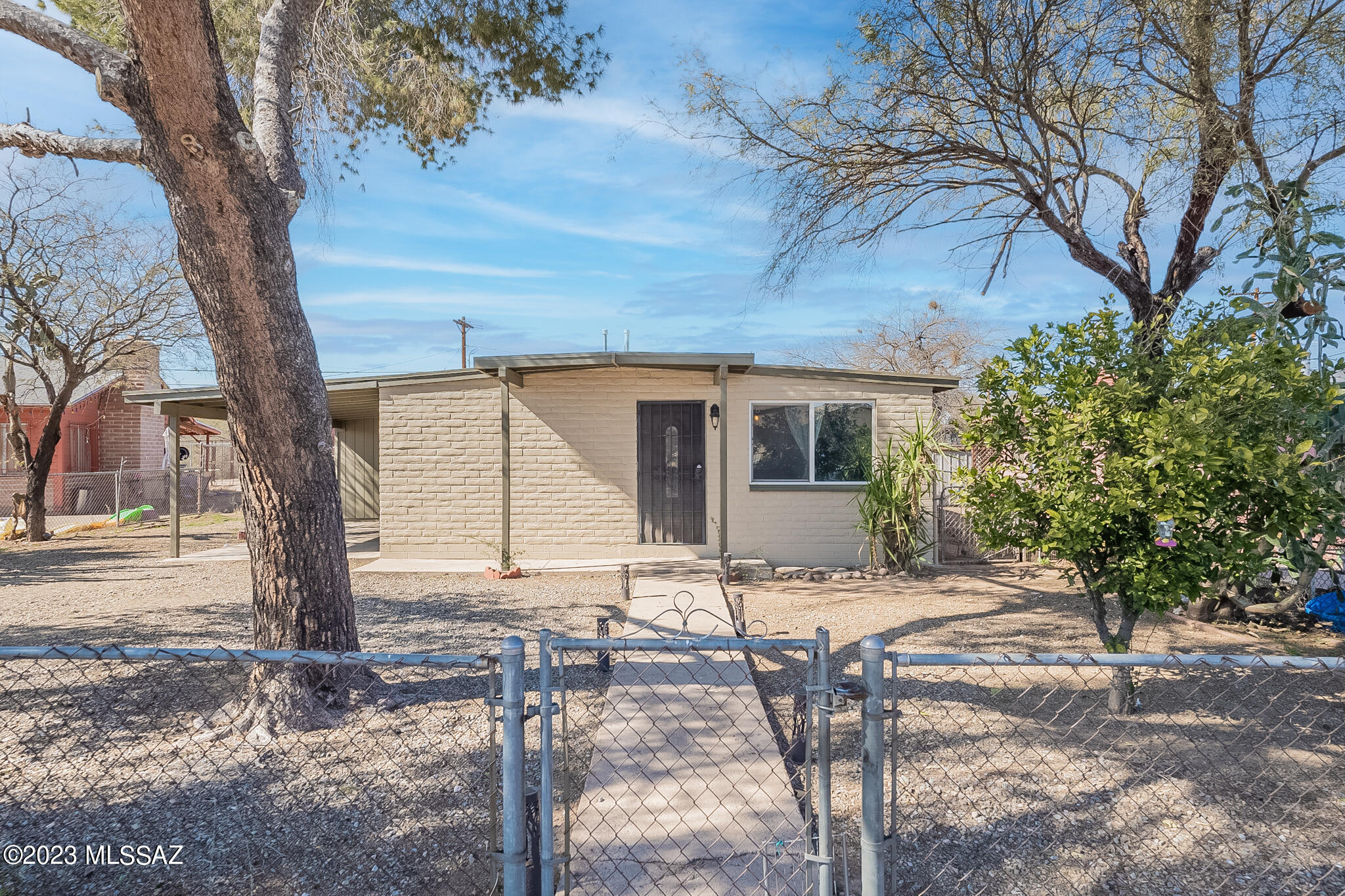 This 3 bedroom 2 bath home welcomes you with an open concept kitchen/living room. The
house has modern ''wood tile'' flooring throughout with updated kitchen and bathrooms. The kitchen features stainless steel appliances, ample cabinet space, and granite countertops.  The front-yard has been landscaped and the backyard has plenty space to design your dream oasis. NEW interior and exterior paint. Roof was recently recoated. Dual pane windows throughout the home.