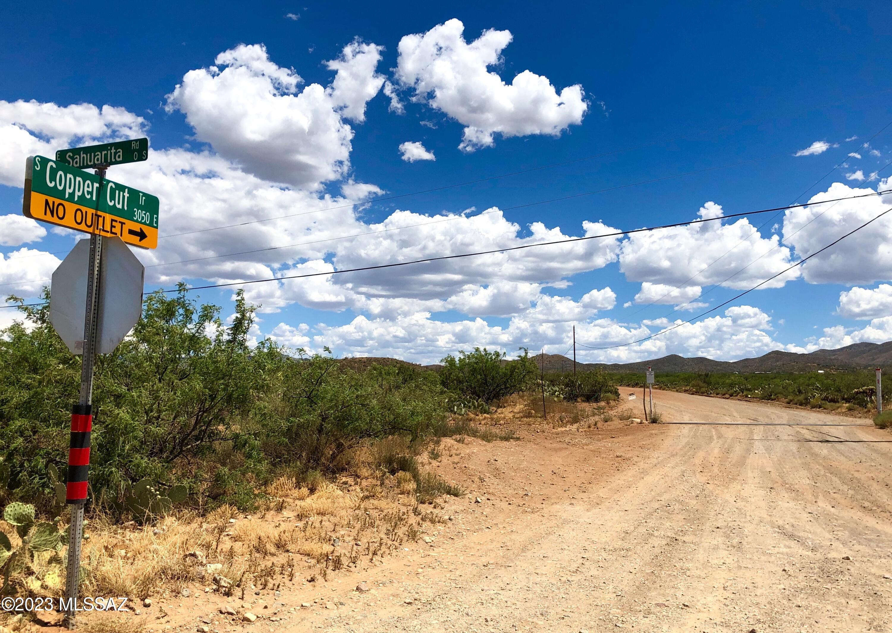 Conveniently situated ~2.4 miles from the paved Sahuarita Rd, these 24+ acres must be toured in person to truly appreciate. Sensational panoramic views, lively topography encompassing part of a mini-ridge, and ~1,500 ft of perimeter directly bordering State Land is just the start! Patented mining claims, old mines, and beautiful colored rock make for a rockhound's paradise! An old jeep road runs through all 5 of the contiguous parcels, allowing for epic views en route to its terminus where a cleared, leveled area (phenomenal potential building site?!) awaits. Another old road/driveway leads up to a roughly-leveled area (potential building site?!) near the parcels' highpoint on the mini-ridge with 'top of the world' views; and to top it all off, the Seller may carry with reasonable terms!