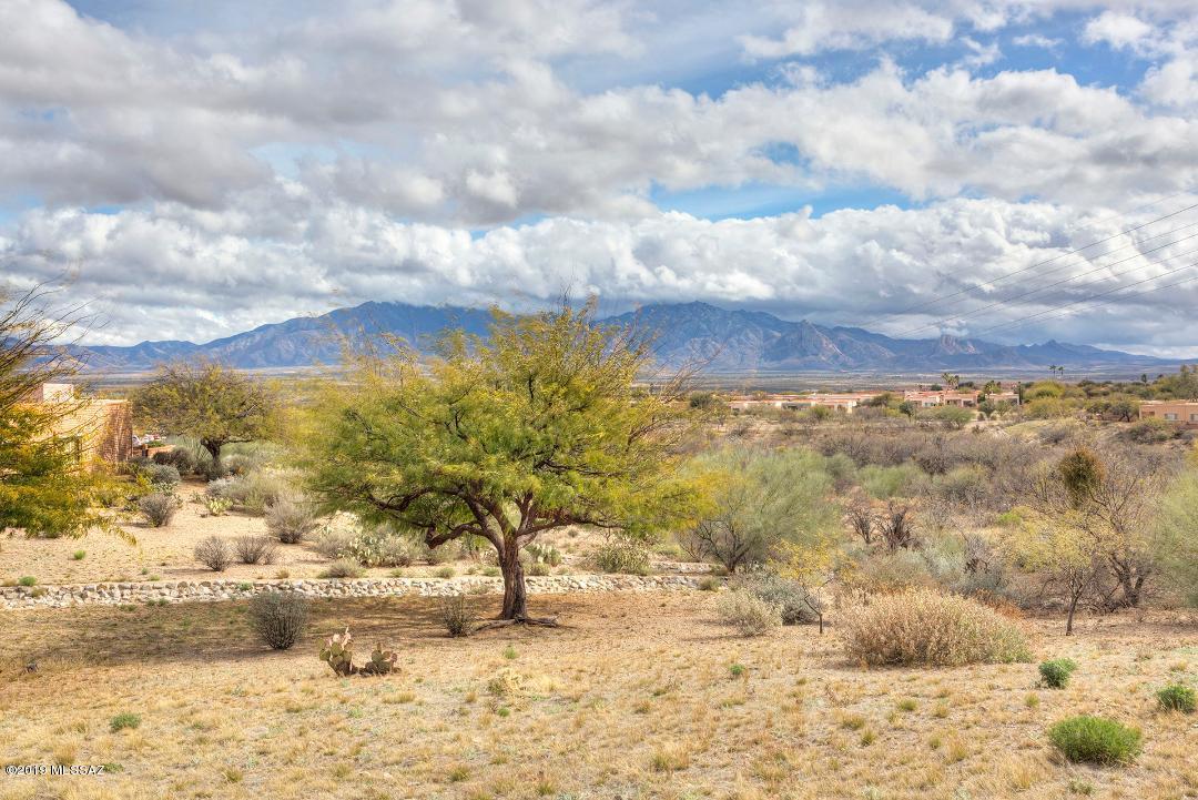 Beautiful mountain views with private patio. Installed canopy for extra covered patio area. Peacefull back patio with fountain. Large eat in kitchen with desk and plenty of solid surface counters and pull out drawers with a pantry closet. Large living room with beehive fireplace. Big master bedroom with walk in closet. Guest room has a murphy bed.