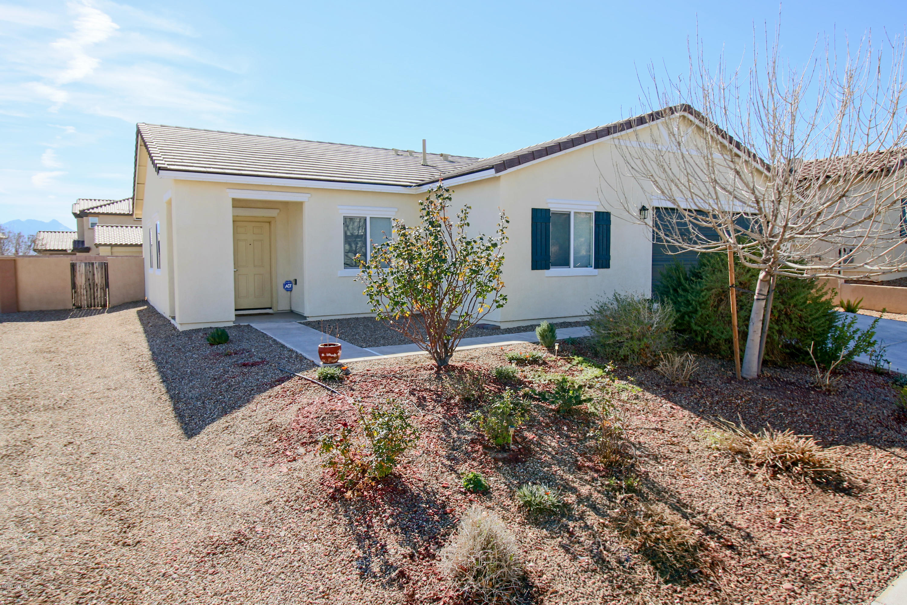 LARGE CORNER LOT 3 Bedroom with 2 Bath home in Award Winning Master Planned Community of Rancho Sahuarita! Short distance to shopping, community pool, school and parks. This home is charming and open with just the right touches. Master bedroom has it's own retreat. Don't forget to see the nice backyard addition...your own tuff shed. AHS home warranty included for one full year on this lovely home.