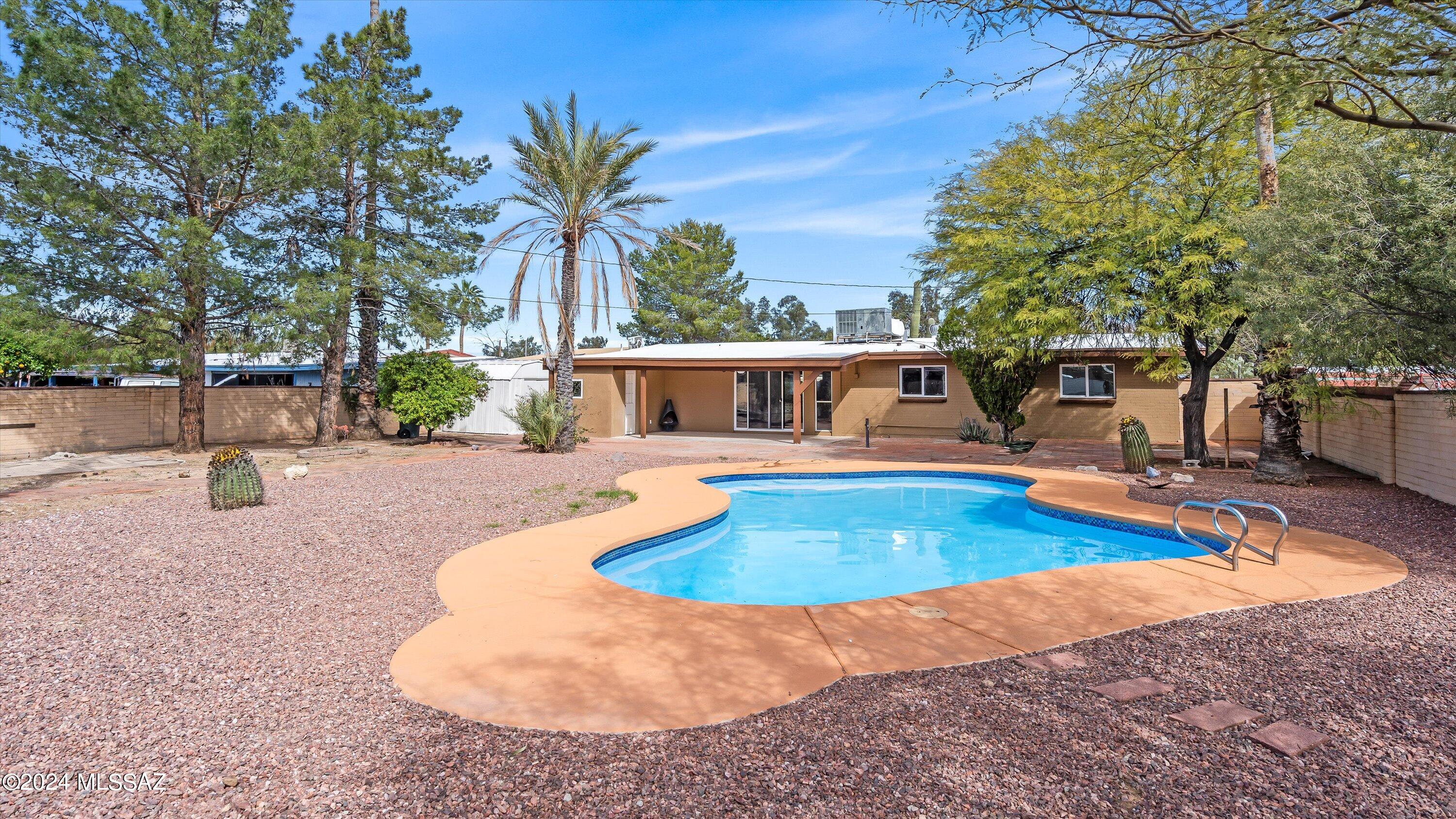 This is the one: Tucson Ranch style 4 bedroom 3 bath extra large lot with swimming pool.
 property was renovated updated dual-panne windows, new kitchen cabinets with Beautifull granite counter tops. 
 too many upgrades to mention.
centrally located: close to everything two public parks within close proximity
enjoy the backyard or just take a swim great place to entertain. 5 MINUTES walking to Park Place Mall. Owner /Agent