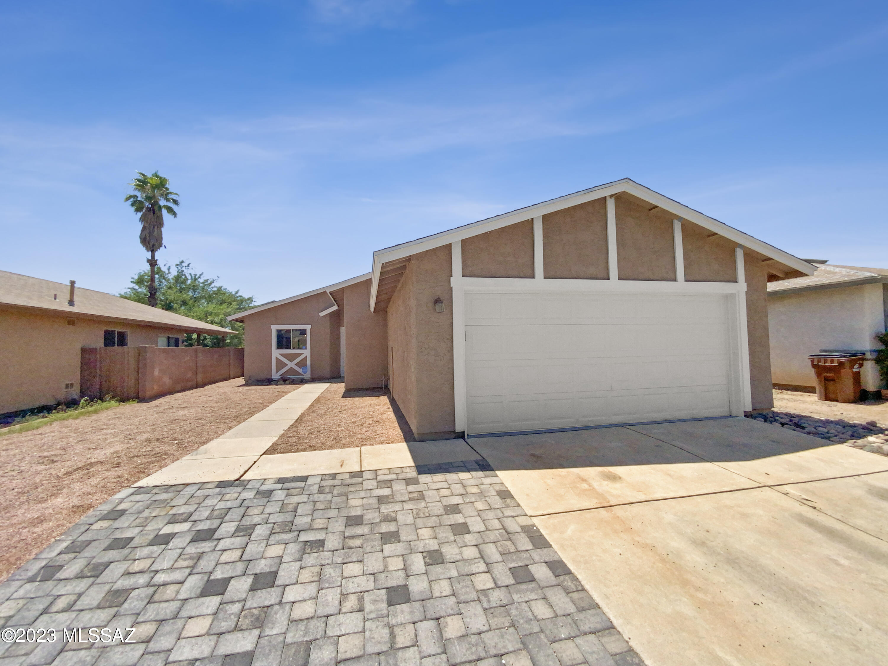 Welcome to the perfect home for entertaining and relaxation! This property offers a natural color palette throughout, making it a perfect blank canvas for your own personal touch. The kitchen boasts a beautiful backsplash, and there are other rooms for flexible living space. The primary bathroom has double sinks, as well as good under sink storage. The backyard is fully fenced in, and features a private in ground pool, as well as a covered sitting area. Fresh interior and exterior paint, as well as partial flooring replacement in some areas, make this home truly move-in ready. Don't miss this opportunity to own a piece of paradise!