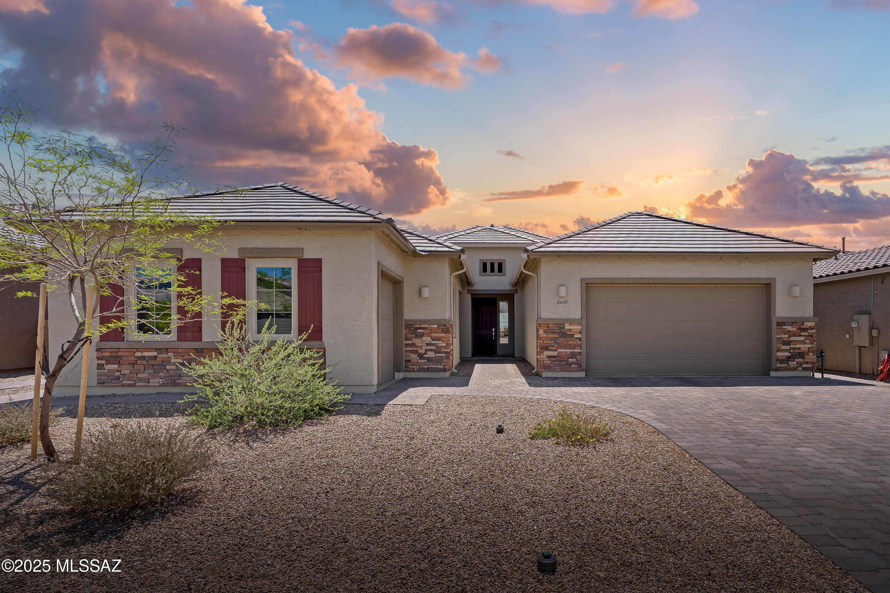 Experience the perfect blend of style, comfort, and versatility in this beautifully designed NextGen home, located in a gated community near the scenic Dove Mountain area of Tucson. Built in 2023, this contemporary residence offers a thoughtful layout ideal for multi-generational living, guests, or even a private home office setup.

The main home features 3 spacious bedrooms, 2 full bathrooms, and a versatile office/den, perfect for remote work or quiet relaxation. The open-concept living area is filled with natural light, showcasing modern finishes and a seamless flow between the kitchen, dining, and great room. The attached NextGen suite offers a private 1-bedroom, 1-bathroom retreat complete with its own living room, laundry closet, and a fully equipped kitchenette— providing a truly independent living space while still being under the same roof.

Situated in a quiet, secure gated community, this home offers both privacy and convenience, just minutes from Dove Mountain's world-class golf courses, hiking trails, shopping, and dining.

Whether you're accommodating extended family, creating a guest retreat, or simply looking for flexible living options, this home delivers comfort, functionality, and peace of mindall in one of Tucson's most desirable areas.
