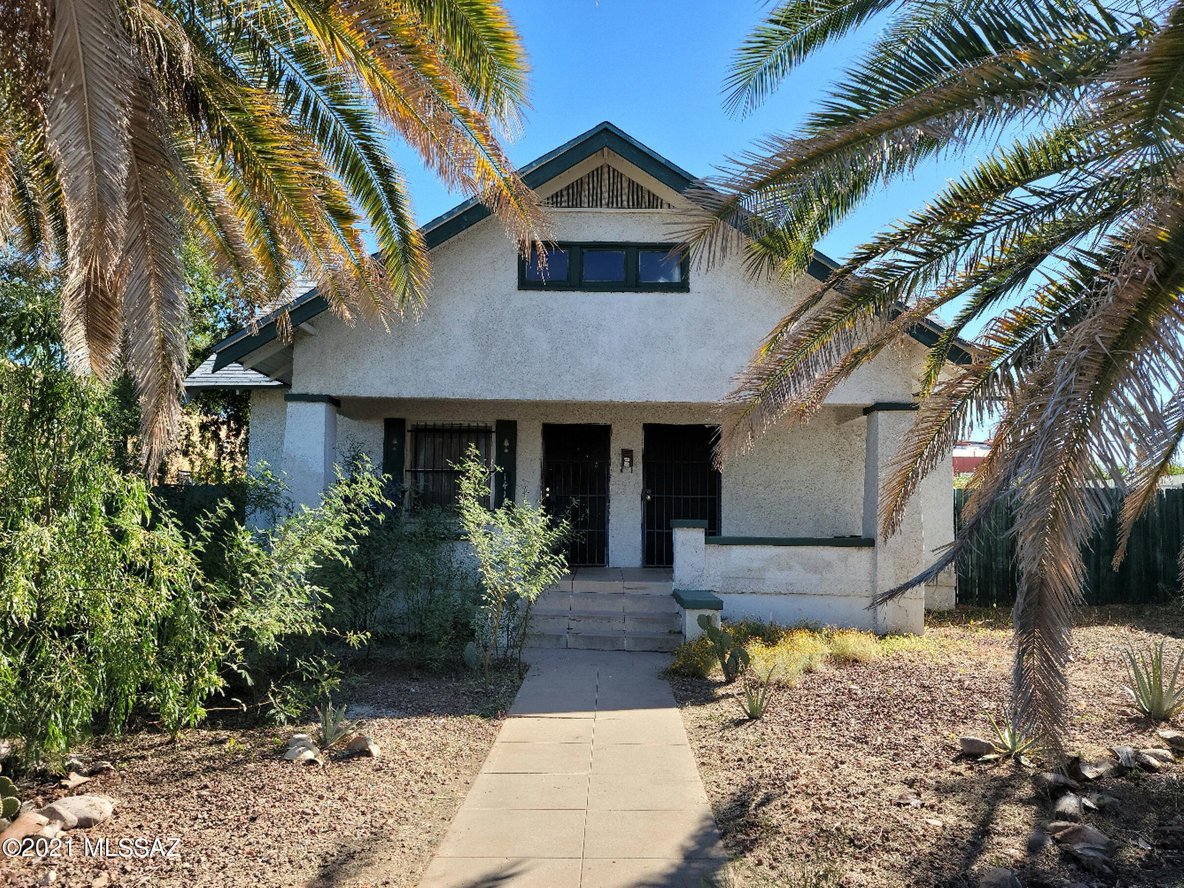 This century-old home is a charmer. The cozy living room includes a fireplace for those cold desert nights in the winter. The adjacent Parlor provides a nostalgic feel, giving access to the two bedrooms and main bath. The kitchen adds to the ambiance of this centurion, which leads to the covered patio and large backyard. The recent rezoning to C-3 will allow for a business. Do not miss out on this historic property!