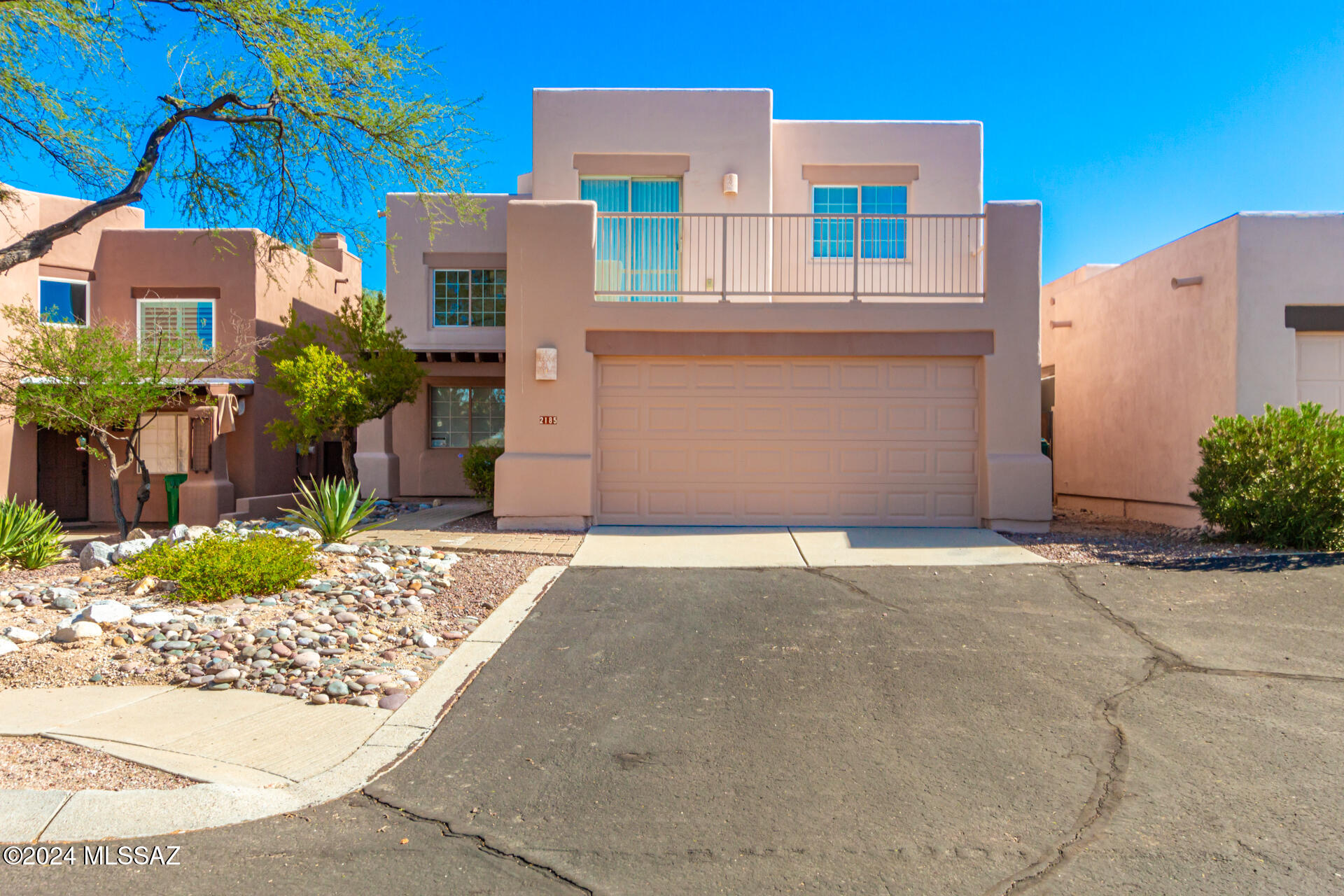 MOUNTAIN VIEWS In Sierra Catalina Estates! This home was completely rebuilt in 2008. 2333 sqft, 4 bedroom, 5 bath home with a creative twist! Living area, kitchen and master Suite on the Second level for those panoramic city and mountain views from 2 decks. Interior features tile flooring, ceiling fans, and fresh neutral palette, creating a warm and inviting ambiance. You'll LOVE the spacious great room, offering breathtaking mountain vistas and balcony access, perfect for relaxation. Upscale kitchen displays recessed lighting, granite counters, stainless steel appliances, and plenty of cabinetry topped with crown moulding. Continue onto the large primary retreat, boasting balcony access, plush carpet, a private ensuite with dual sinks, and a walk-in closet.