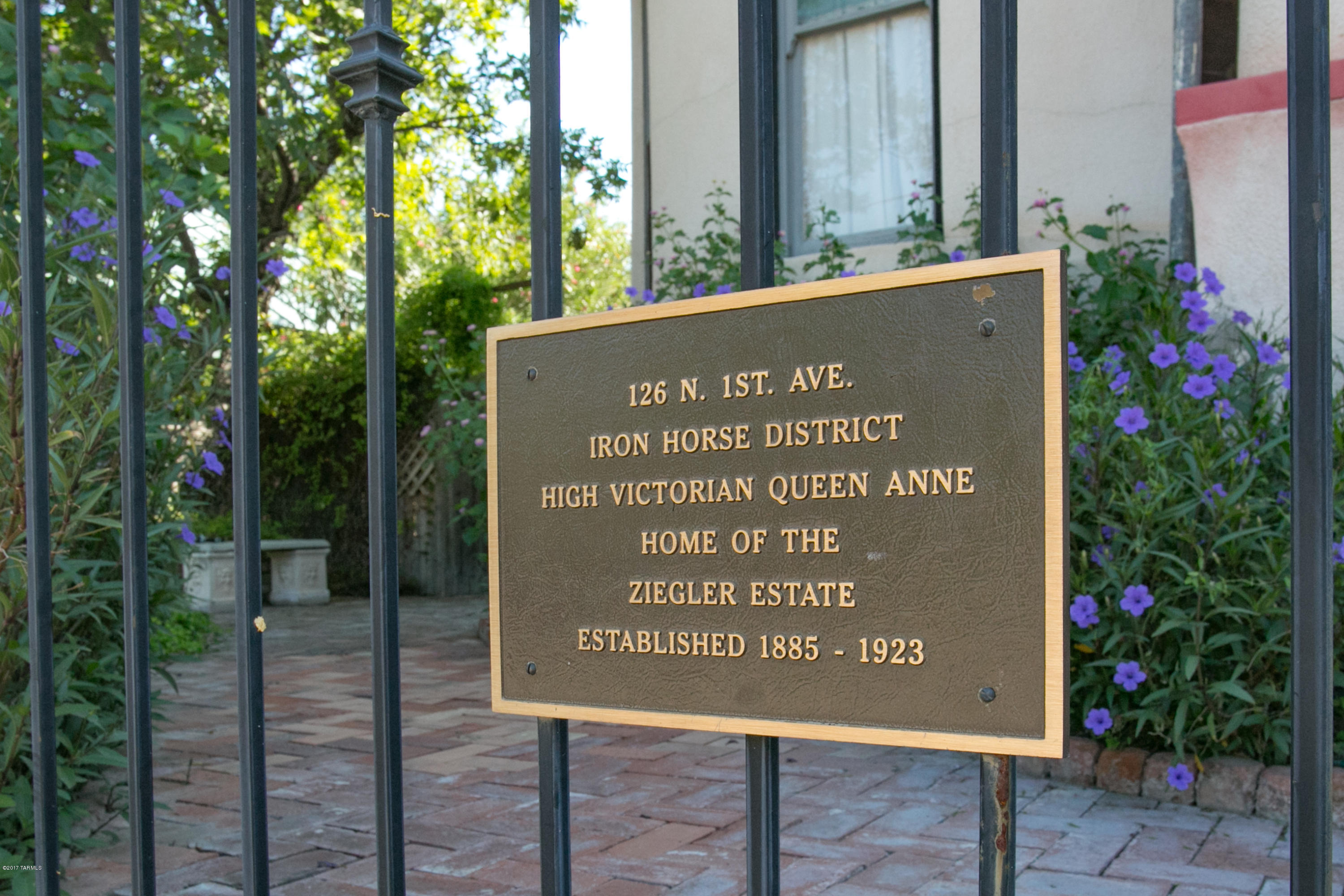 A TRUE QUEEN ANN REVIVAL! THE WINNER OF THE TUCSON ASSOC OF REALTORS TOUR!!! Ironhorse Historic District! Originally built in 1885, by Peter and Mary Ziegler - Ziegler was the first Railroad engineer to build and reside in Tucson. A beautiful example of Queen Anne Revival Architecture was finished in the next few years. Listed on the National Register of Historical places & historic routes and tours. Truly worth a visit - home truly has been loved & cherished while modernizing some aspects yet keeping the charm from the day it was built. Home boasts a Large Foyer, Front Greeting Rm, Music Rm, large dining Rm, Rm for a grand piano, Large original kitchen, Pantry, 4 bds, 2 baths, balconies, porches and so much more. A treasure to show - You'll love it!