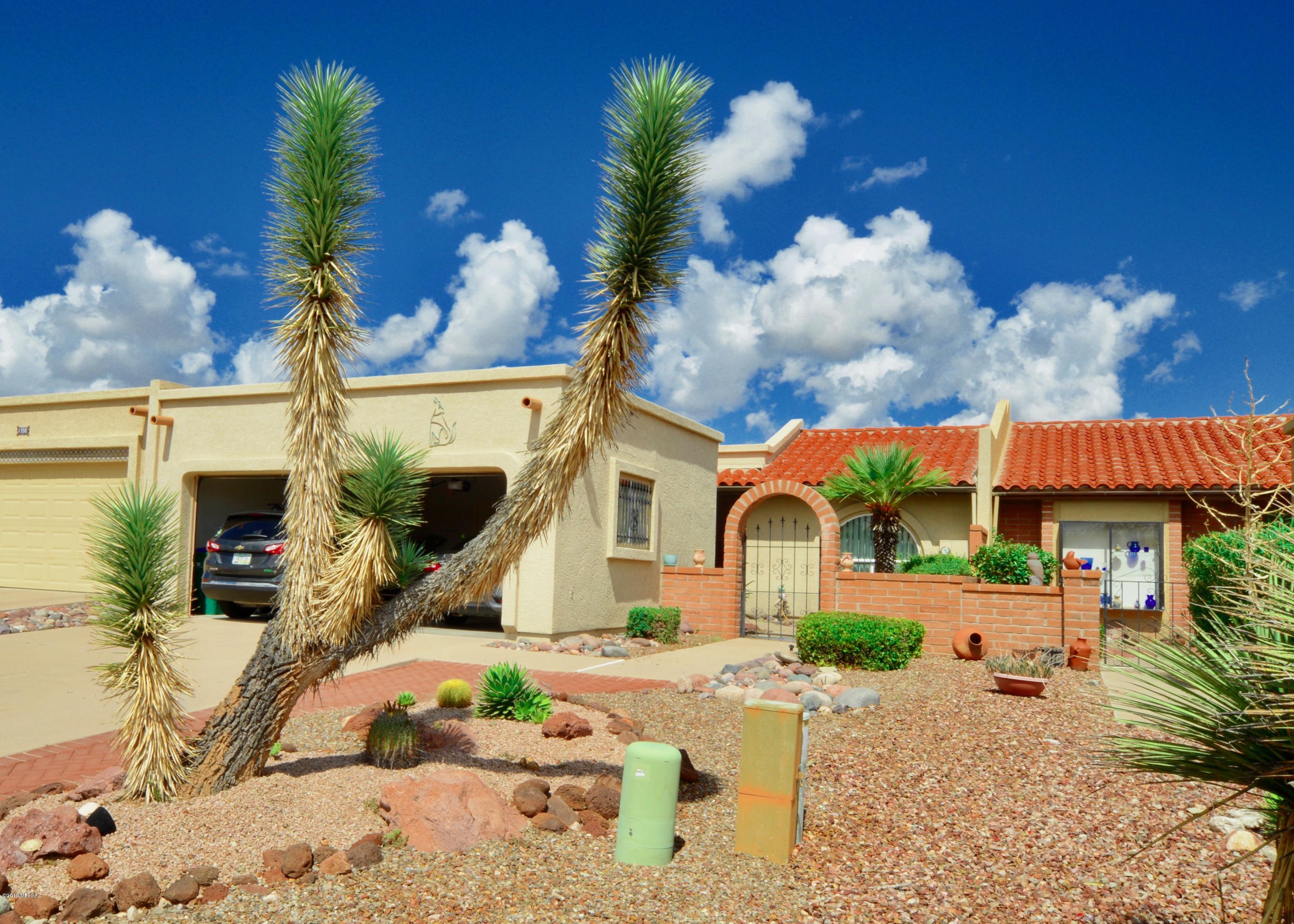 Super clean town home in Desert Hills 4. AC is only 3 years old, roof just re coated. Tile in all the right places. The back patio is open to common area and has a special private sitting area off the master- perfect for a garden oasis or hot tub.
