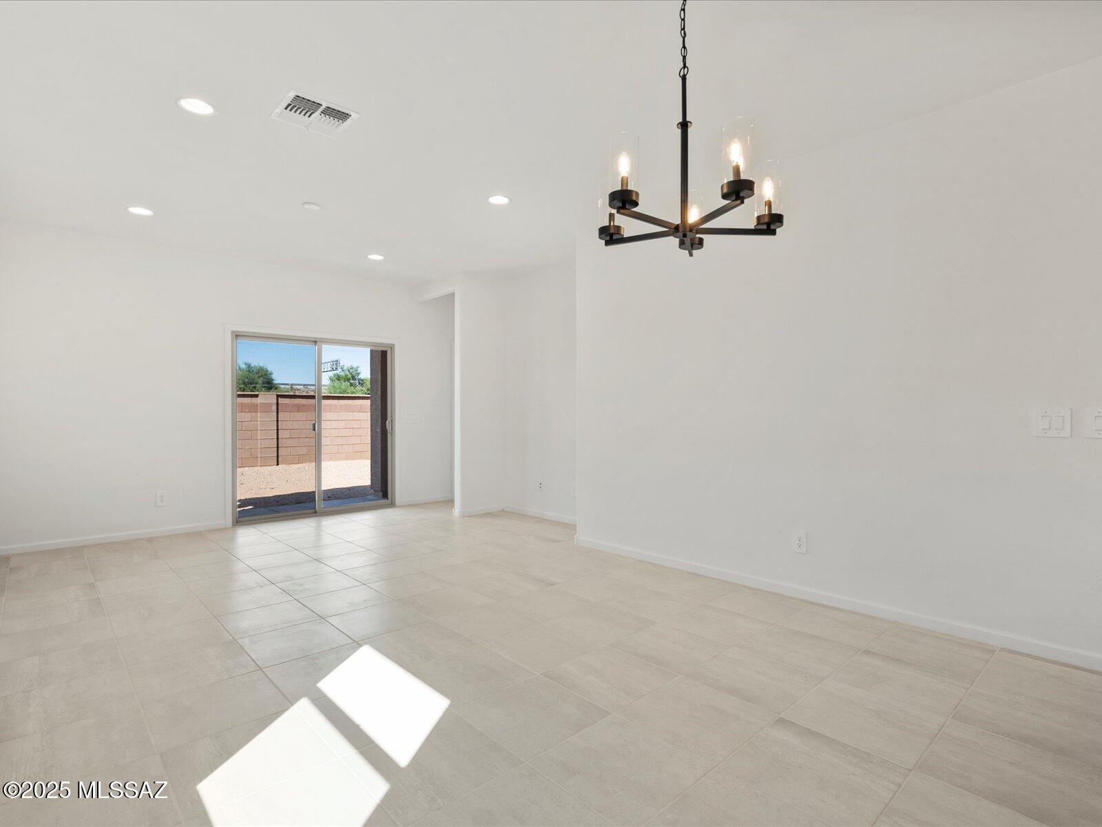 This 4-bedroom, 2-bath home offers comfort, functionality, and style. The open kitchen features a center island, perfect for casual dining or entertaining, with umber cabinets, cream/black granite countertops, and Travertine-look tile flooring paired with warm neutral carpet.

Enjoy close proximity to Davis-Monthan Air Force Base, Tucson International Airport, and The Loop Bike Trail. Community amenities include a neighborhood park and more.

Move-in ready with washer, dryer, fridge, and whole-home blinds included!