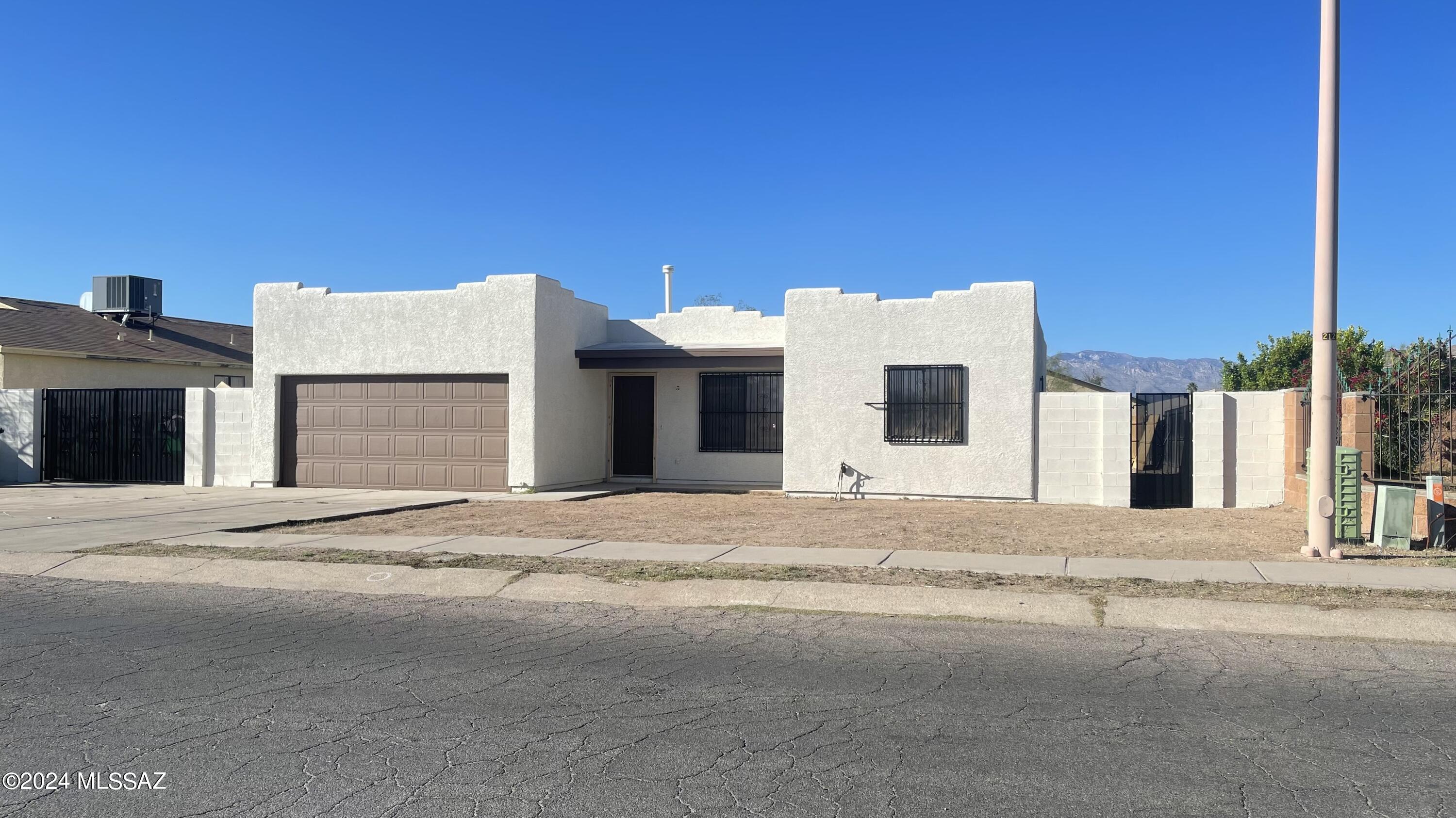 Step into the life you've envisioned with this meticulously renovated home, perfectly positioned near shopping, dining, schools, and the University of Arizona. Upon arrival, be charmed by the convenience of this prime location. Imagine entertaining loved ones in the expansive patio, customizable to your taste. Inside, discover thoughtful upgrades throughout, including a modern kitchen, upgraded appliances, renovated bathrooms, and new flooring. Enjoy worry-free living with a brand-new HVAC system. Outside, a spacious patio beckons you to enjoy the Arizona sunshine or host enchanting alfresco dinners. Every detail has been carefully considered to enhance daily living. Don't miss this opportunity to transform this into your personal oasis amidst the vibrant heart of it all.