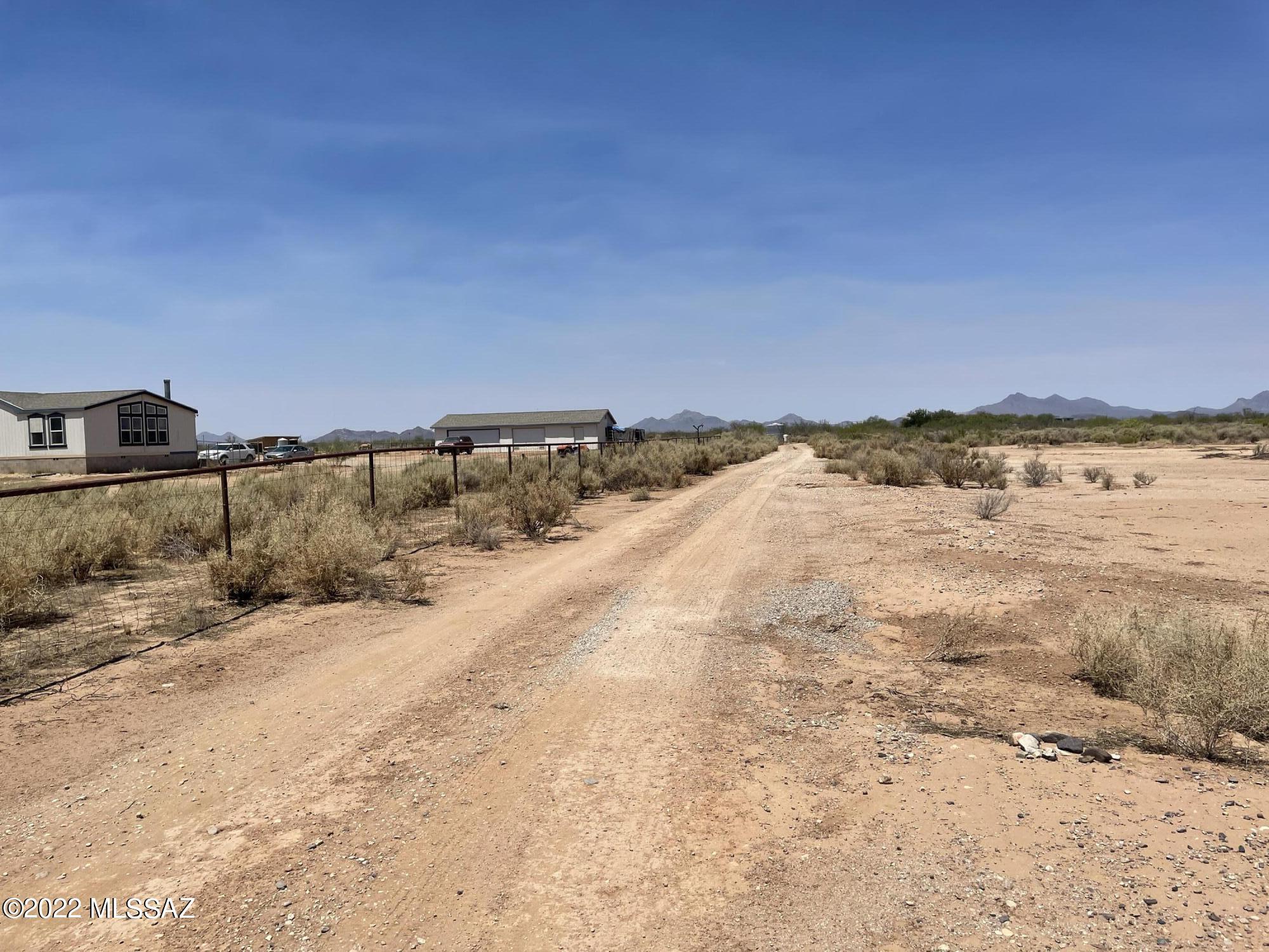 Quiet country homesite with lots of room for horses and level land for improvements.  Water and electric at property line.  Mountain views all around.  Only about 25 minutes to shopping, restaurants, etc.
Close to Desert Springs Equestrian Center.  
See maps & SPDS in Documents.   
OWNER/AGENT DISCLOSURE: Listing broker is also an owner of the subject property.