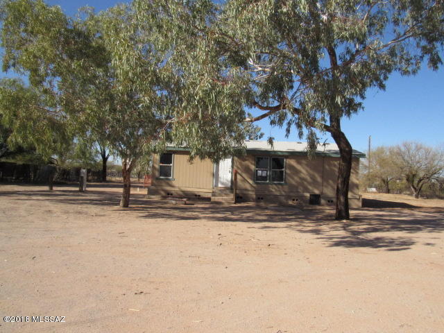 Price Reduced. Save thousands. HUD Home. Acre + lot. Opportunity knocks. Great value at a modest price. Affordable living for the budget minded. Spacious home, bright and open floor plan. 3 bedroom , 2 baths, big kitchen.  Enjoy the country lifestyle and no HOA!! Located on a full acre of lush desert vegetation. Room to store the toys. Perfect for 4-H projects. Located near Roadrunner Elementary This is a must see! Investors welcome to bid 15 days from list date. Note buyers will be responsible for utility turn-on and any required permits for utility connect and re-winterization fee. Buyer to verify all info
