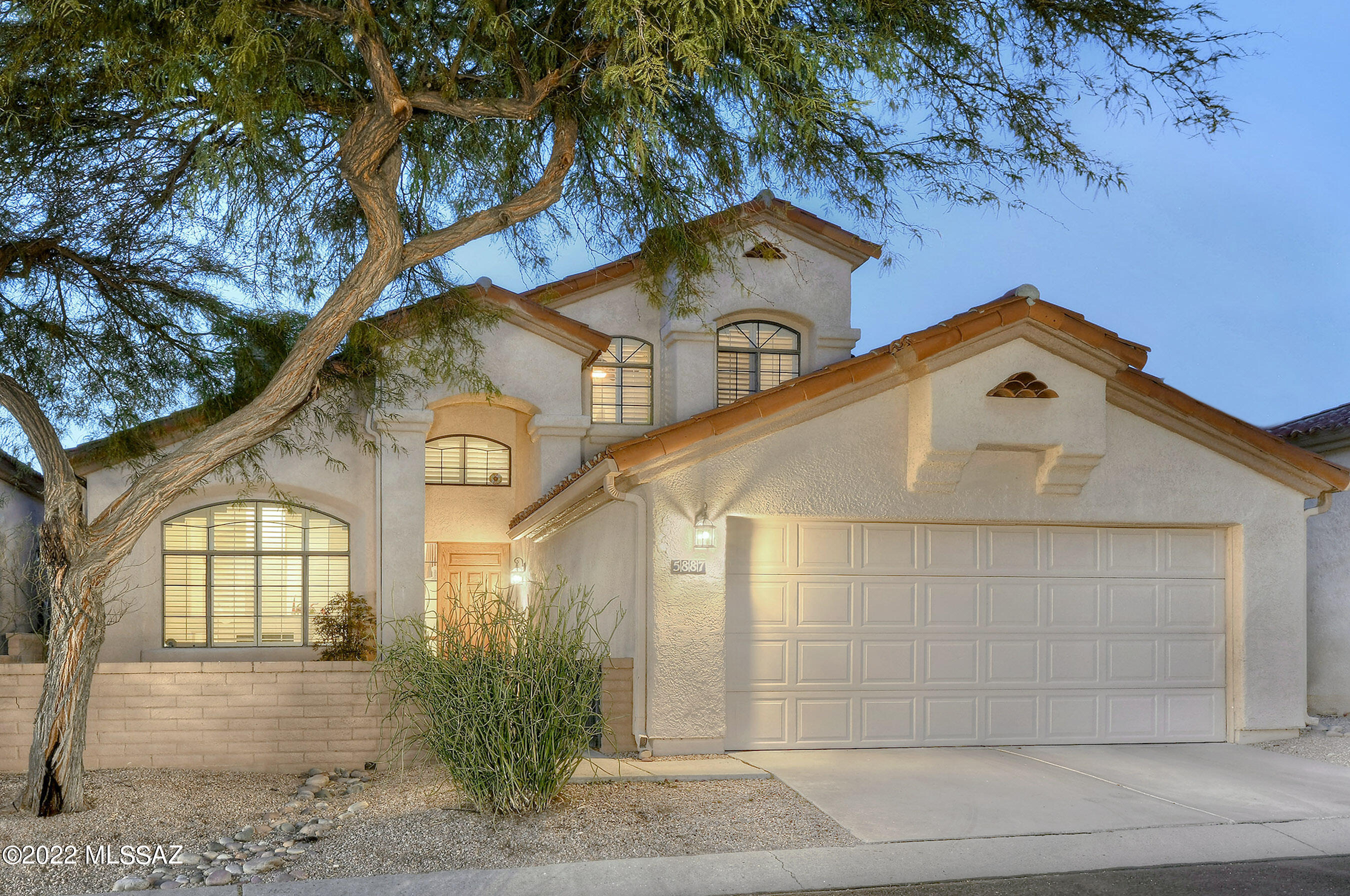 Stunning California contemporary home with mountain views in prestigious, manned gated La Paloma.  Totally remodeled throughout. Exquisite living room & formal dining room with dramatic 18 ft ceilings, elegant fireplace, large picture windows, gorgeous tile floors, plantation shutters, gourmet island kitchen w/ new white cabinets, granite countertops, designer tile backsplash, stainless steel appliances, refrigerator, lovely breakfast area, cozy family room with fireplace, 3 bedrooms plus loft/study. Master suite w/ luxurious bath, granite countertops, double vanity, garden tub, separate shower, lg walk-in closet & private balcony. Oversized 2 car garage & laundry room w/ washer & dryer.  Enjoy the backyard w/ covered patio & lush landscaping.  Community pool & spa. District 16 schools.