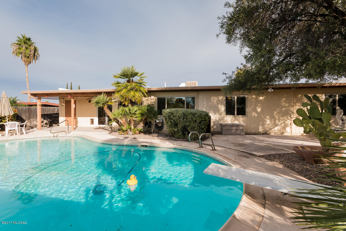 $15,000 PRICE REDUCTION - SELLER WILL CONSIDER OFFERS BETWEEN $185 - 195,000. BE SURE TO TAKE A LOOK AT THIS VERY NICE MOVE-IN-READY 3 BEDROOM 2 BATH HOME. MANY UPGRADES INCLUDE GRANITE COUNTERS, FRESHLY PAINTED INTERIOR, AND A LARGE SPARKLING POOL.  AND TAKE TIME TO RELAX IN THE PRIVATE AND WONDERFULLY SHADED AREA IN THE BACK YARD, PROVIDING A LUSH AND RESTFUL RETREAT. THE HOME HAS BEEN CONTINUOUSLY TAKEN CARE OF. NOTE THE TWO LARGE ADDITIONAL STORAGE ROOMS IN THE GARAGE (ONE IS A QUITE LARGE WORKSHOP), AND A THIRD STORAGE ROOM ACCESSED FROM THE PATIO AT THE REAR OF THE HOME IS ALSO VERY LARGE. THIS HOME TRULY OFFERS THE OPPORTUNITY TO BE LIVING WELL IN THE DESERT. COME SEE IT -- YOU WILL NOT BE DISAPPOINTED!