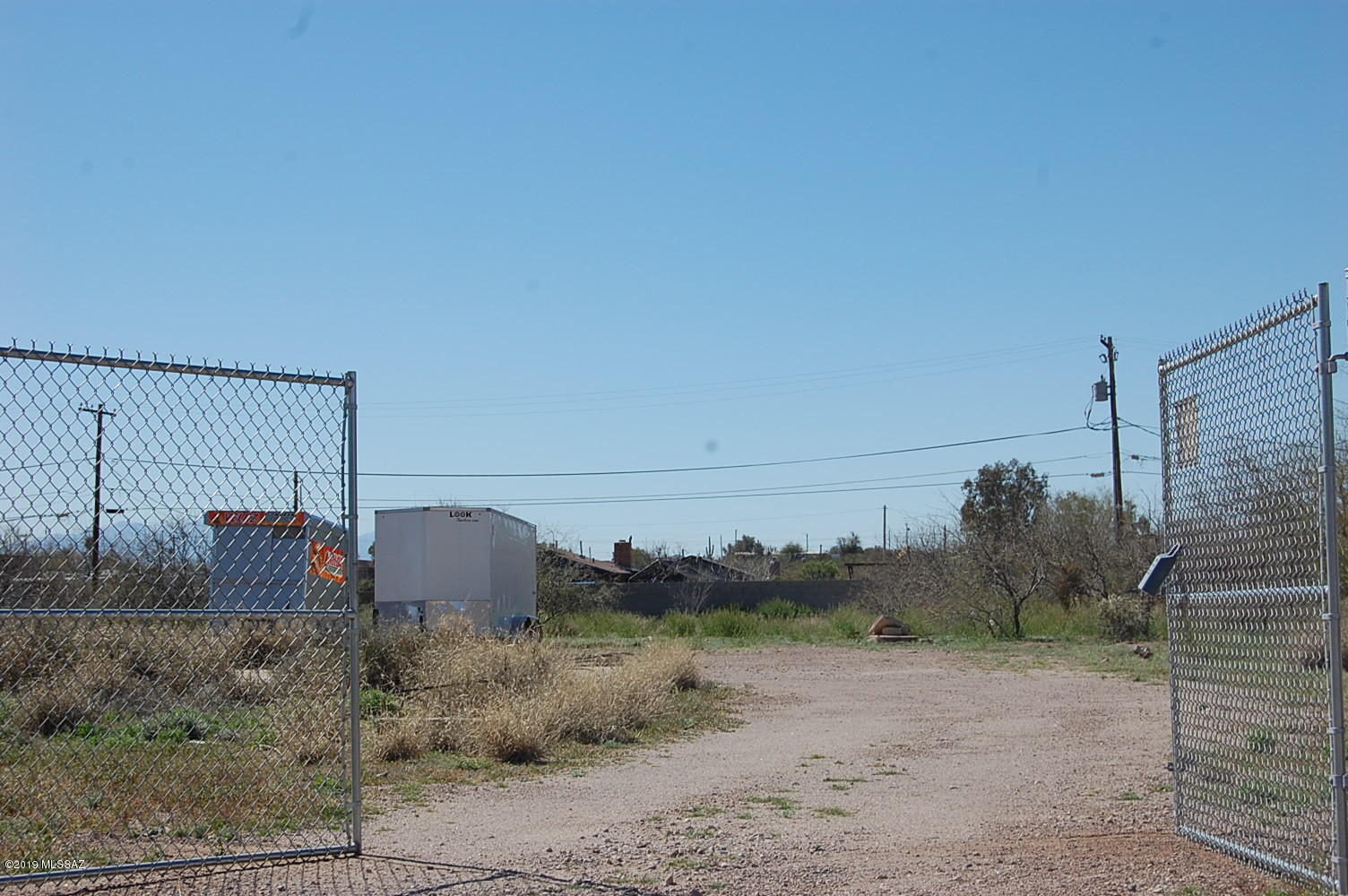 Large lot with view of Sentinel Peak. Utilities to lot line and no HOA. No gas. Great location. Close to I-10 and downtown Tucson. R-1 zoning.