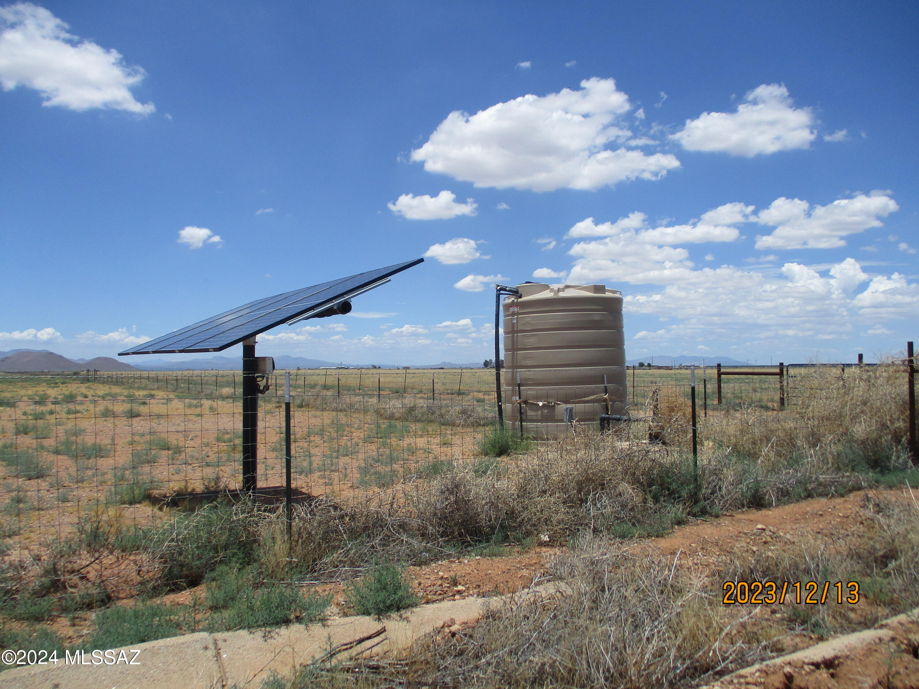 80 ACRES WITH  SOLAR POWERED WELL. 16'' IRRIGATION WELL CASED WITH 8'' STEEL CASING. LAST MEASUED AT 555'  DEEP AND STATIC LEVEL AT 343' , WHICH WAS COMPLETED MARCH 1, 2022. NEWER WATT SOLAR WELL SYSTEM WITH AC BYPASS CONTROL BOX. YOU CAN PUMP WATER FROM GRID POWER OR A GENERATOR BACK-UP. COMES WITH A 3000 GALLON STORAGE TANK. THE PROPERTY I  COMPLETELY FENCED WITH 54'' GOAT GOAT FENCING. THERE IS A SHED ON THE PROPERTY 12'X40' THAT WILL CONVEY WITH THE SALE. BEATIFUL MOUNTAIN VIEWS.