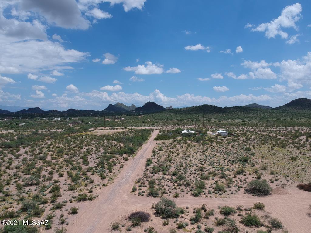 GORGEOUS ONE ACRE LOT SURROUNDED BY BEAUTIFUL VIEWS. LOT IS PERFECT FOR THOSE LOOKING FOR PEACE AND QUIET BUT ENJOY DRIVING INTO TOWN IN LESS THAN 20 MINUTES. 15 MINUTE DRIVE TO SHOPPING, ENTERTAINMENT AND I-19. ABOUT 1 MILE NORTH OF CASINO DEL SOL. LOT IS LOCATED IN A DESERT ''ISLAND'' SURROUNDED BY PASCUA YAQUI LAND AND FEDERAL LAND.  ELECTRIC IS LESS THAN 100 FT AWAY. BEAUTIFUL SUNSETS, MUST COME AND TAKE A LOOK. 2 ADDITIONAL ACRE LOTS NEXT TO THIS ONE ALSO FOR SALE (MLS # 22130721 AND 22130722). SELLER IS A LICENSED REAL ESTATE AGENT IN THE STATE OF ARIZONA.