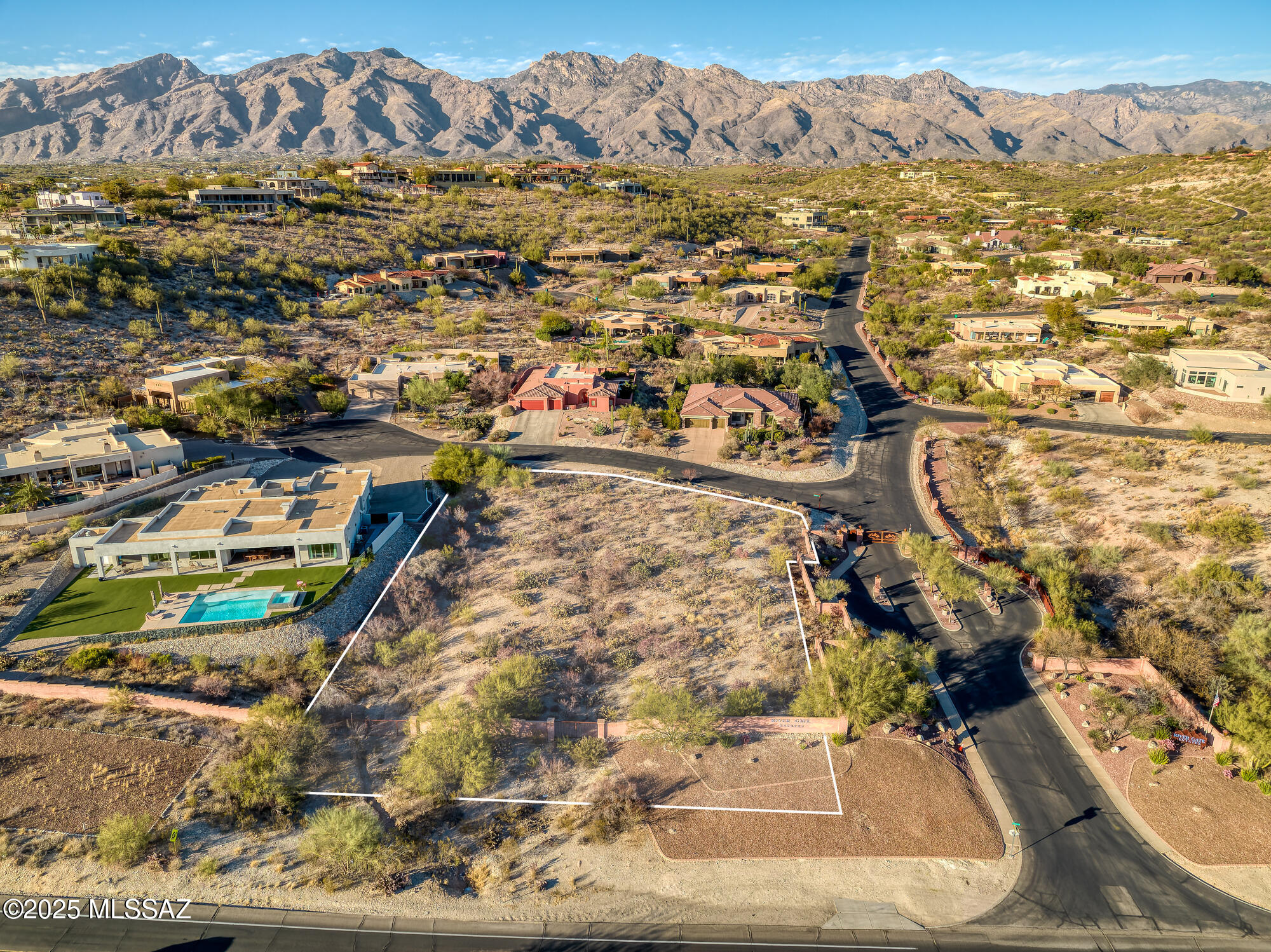 Build Your Dream Home in River Gate Estates

Discover the perfect canvas for your dream home on this exceptional 0.99-acre lot in the prestigious, gated River Gate Estates. Offering ideal north/south exposure, this parcel boasts breathtaking city views and a serene setting within one of the area's most sought-after communities.

Enjoy the convenience of nearby amenities, including the Whole Foods shopping center, top-rated BASIS School, excellent dining options, and the scenic Rillito River bike path, known as ''The Loop.''

Buyer to verify all utilities. Don't miss this rare opportunity to create a home that truly reflects your vision in a premier Catalina Foothills location.