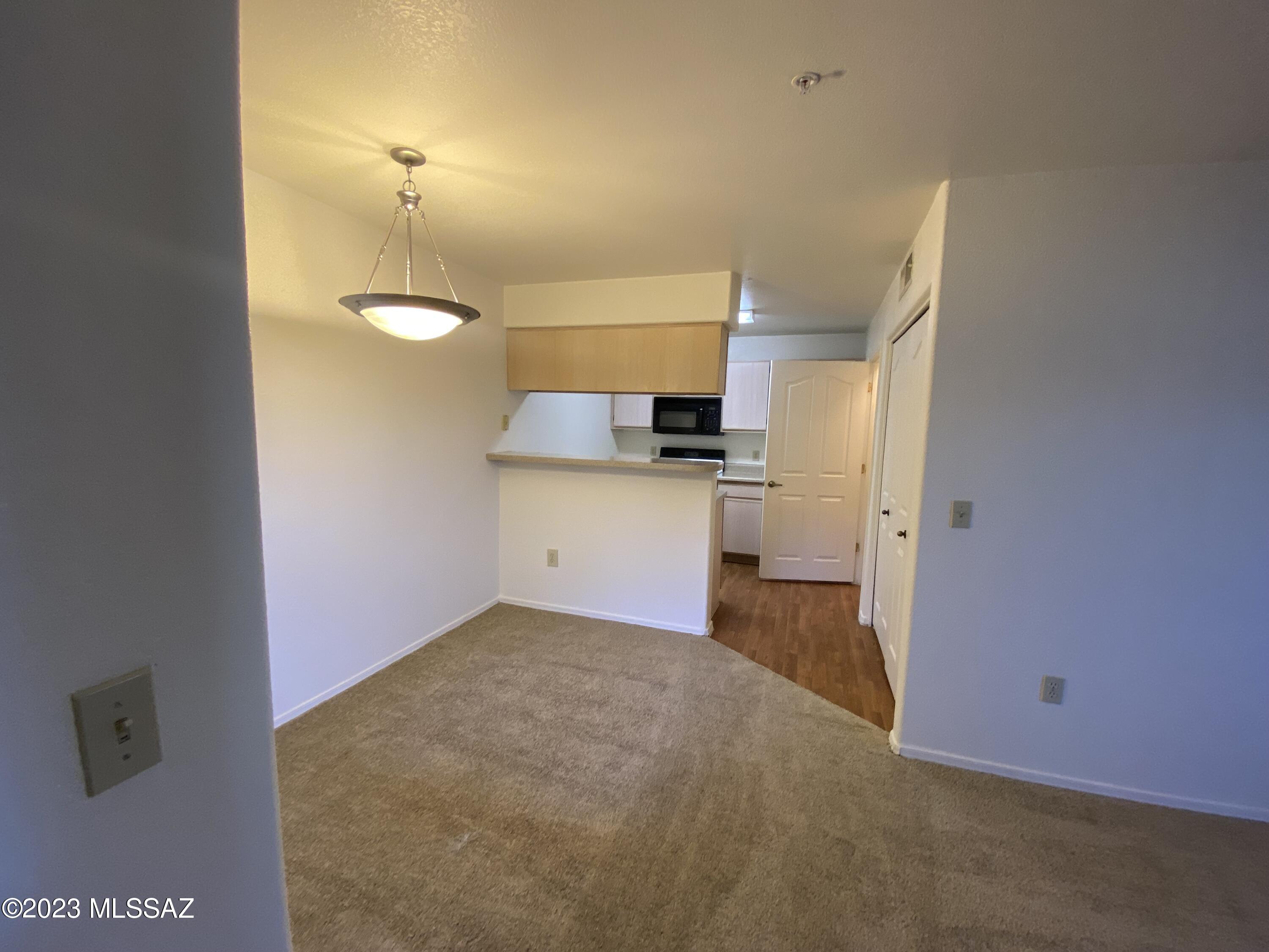 Spacious one bedroom condominium includes kitchen with breakfast bar, extra large pantry and full size washer and dryer. Dining nook with window is separate from your spacious great room. Over sized linen closet is between your bathroom and bedroom. Bedroom features ample walk in closet with mirrored door. Community is 24 hour gated access, with a fitness center, 2 resort like pools with spa's and water features and verdant landscaping throughout.