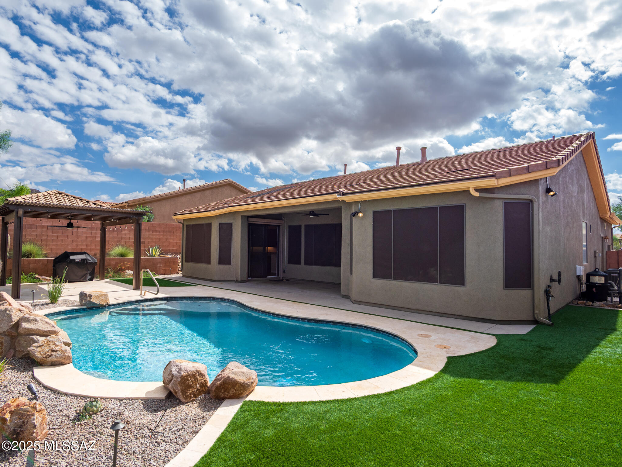 Text for a Walkthrough Video/more info. This 3 Bedroom/2 Bathroom + Family Room 2250sf Home located in Dove Mountain boasts a long list of Premium Amenities. Enjoy the preserved view of the Tortolita Mountains from the Pebble Tech Pool w/ Travertine deck surround + Shade Pergola. Upgraded Interior Features incl; Kitchen w/ Granite Countertops + Gas Range; Master BR Suite w/ Private Bath incl Dual Vanities, Soaking Tub, Shower, + Walk-in Closet; Ceramic Tile floors throughout + Carpeted BRs ; Plantation Shutters; Surround Sound; EV Charger, 3 Car Garage; Gas Fireplace, and Updated + Efficient HVAC units and Water Heater. Located in Marana Schools near Golf + Hiking/Biking Trails at Dove Mountain plus easy I-10 Freeway access. 1yr minimum Lease w/ 2yr Lease available. Costs are; $50/adult Application, $3495 Security Deposit, $450 Cleaning Fee, $150/pet with Approved Pet. Tenant pays Electric, Nat Gas, Water, Sewer, Trash.