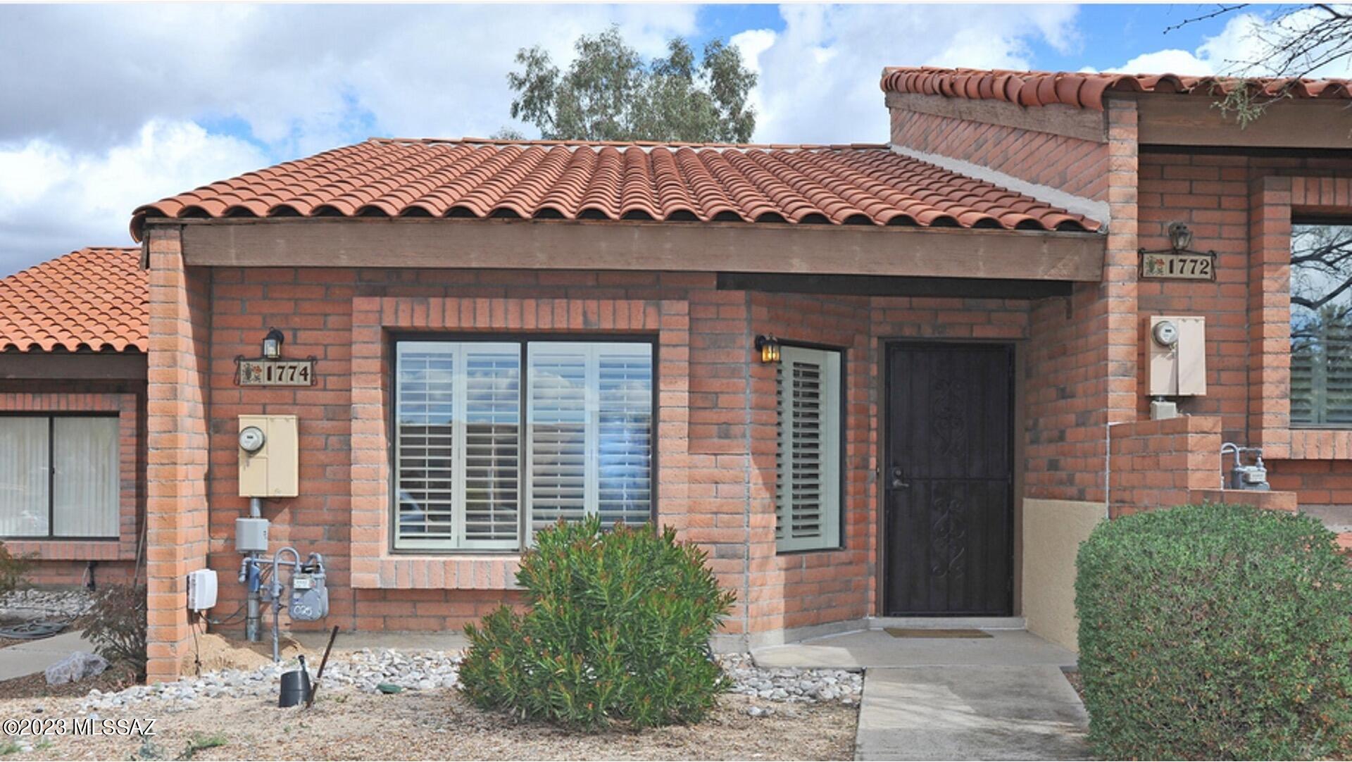 VIEWS, VIEWS!  This charming town home nestled in La Cholla Hills 55+ community offers open layout with vaulted ceilings and lots of windows that give a voluminous feel the minute you walk through the door.  Renovated kitchen includes stainless steel appliances, abundant natural wood cabinets with pantry, and granite look-alike countertops. The spacious owner suite is perfectly situated with dual closets, updated vanity in bath and walkout to enclosed porch where you can enjoy serene mountain views and gorgeous Arizona sunsets.  Many HOA amenities included.