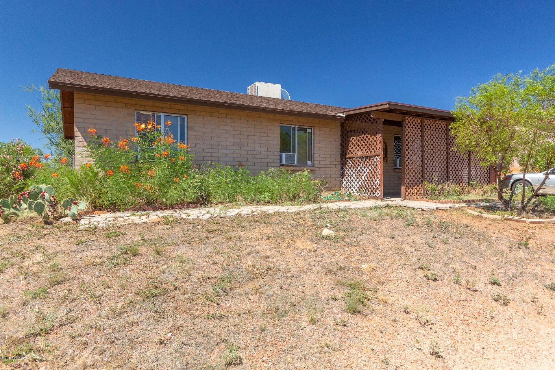 Charming brick home situated in Twin Lakes! Upon entering you are greeted with a spacious great room, tile flooring, neutral color tones and generously sized bedrooms. Enter the kitchen/dining area and you are met with white appliances, ample counter space and glass sliding doors leading to the large backyard with mountain views and plenty of room to make your own! Don't let this gem pass you by, schedule you showing today!