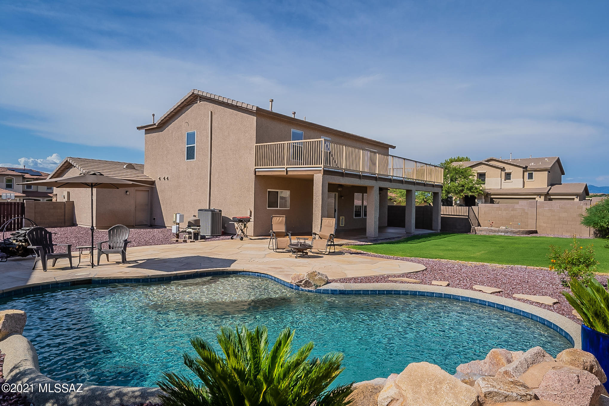 Great entertaining home with a Backyard Oasis. Sparkling Salt Water Pool with a Waterfall Feature. Situated on a small cul-de-sac, with the distinction of a HUGE Corner Lot. Great floor plan includes 3 bedrooms with a Loft Space that can be converted to a 4th Bedroom. Family Room, Living Room, Separate Dining Room and Breakfast area. Large Balcony off Master Bedroom with Awesome Mountain Views. Master Closet is HUGE. Separate Tub and Shower in Master Bath. 3 car garage with extra shelving. Whole home is on Water Softener. Reverse Osmosis in the kitchen. OPEN HOUSE AUG. 21st 1-4pm, AUG 22 1-3pm.