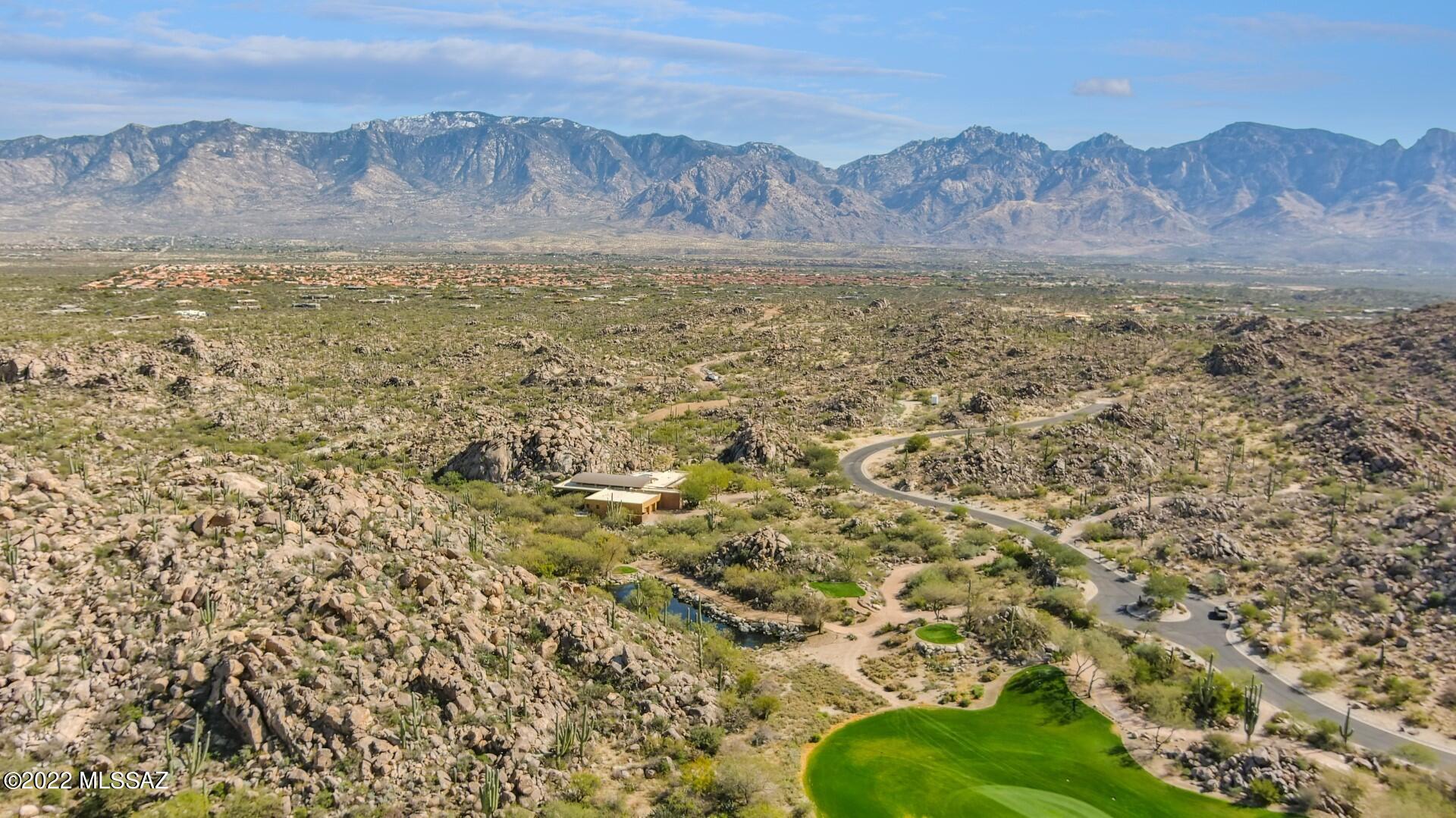 Tucked inside the gates of the exclusive Stone Canyon community, high on the hilltop, you will discover the prestigious wonders of Lot 337.  Enhanced with stunning views of towering saguaros and impressive rock croppings.  This easy-build homesite expands over one acre offering a private + tranquil setting with gorgeous views of the Tortolita & Catalina Mtns.  

Get a jump start on your own vision with the recent survey and soils report or, save thousands of dollars on architectural plans and expedite the design process by nearly a year with the conceptual design created by award-winning architect, Marc Soloway.  Meticulously appointed to capture views from every angle.  The plans have been approved by the HOA and they are ready to be submitted for permits.  
Enjoy all of the finest amenities; state-of-the-art Fitness Center, Clubhouse & Championship Golf Course.  Consistently ranked among the top 100 residential golf courses in the nation according to Golf Digest.  
While you are within the gates of Stone Canyon you feel a million miles away, however in truth, you are within reach of everything Oro Valley has to offer.  A divine jewel within the Sonoran Desert!