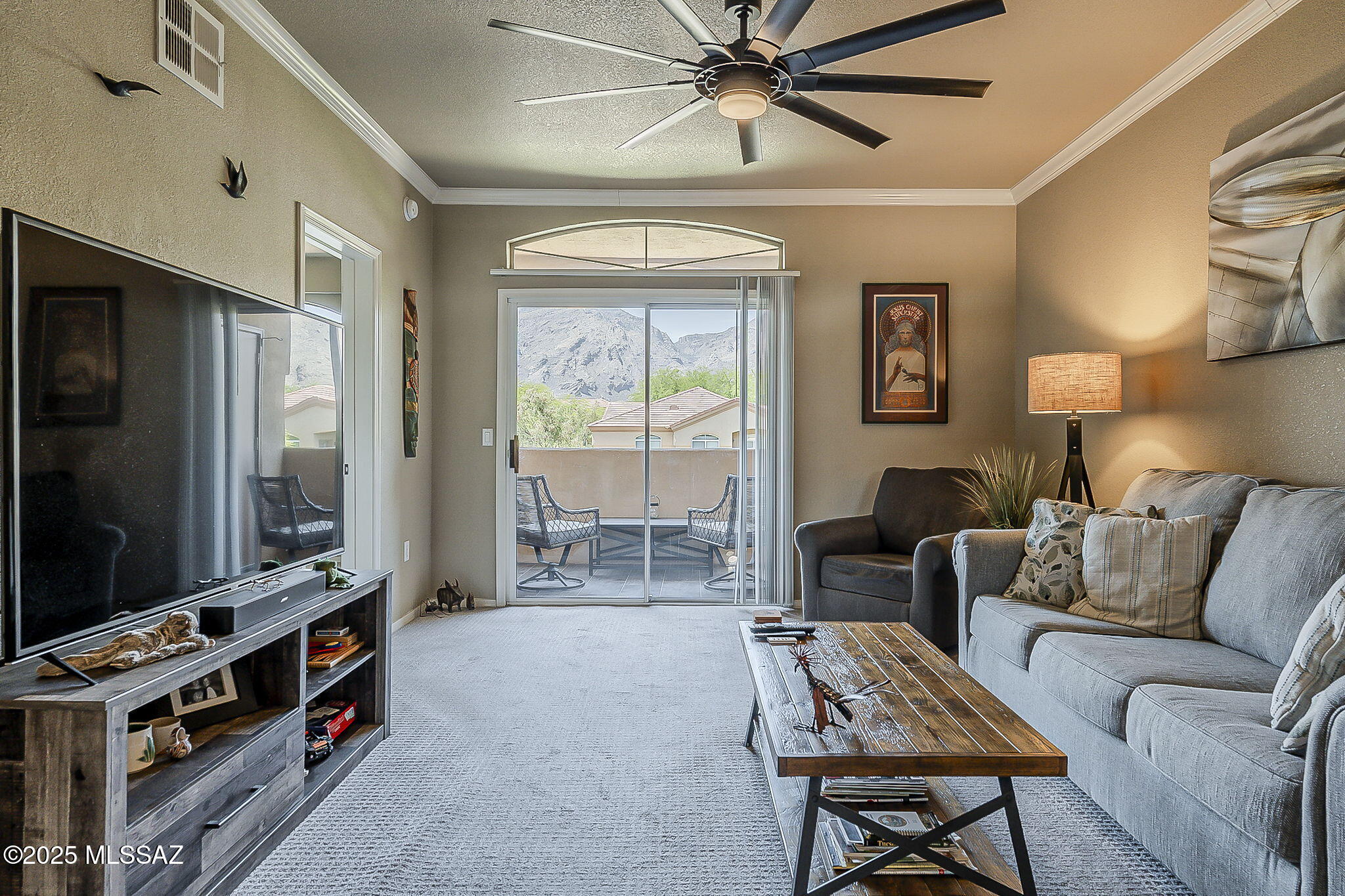 Enjoy breathtaking Catalina Mountain views from this charming two-bedroom, two-bath condo offering approximately 1,074 sq. ft. of comfortable living space. The bright and spacious primary suite is filled with natural light, creating a relaxing retreat.  The seamless connection between kitchen, dining, and living areas, ideal for both everyday living and entertaining. The suite also comes with a private garage, a new HVAC system, a new hot water heater, and a private laundry room with washer and dryer. Located within a gated community that offers a heated pool and spa, a clubhouse and fitness center, it is minutes from shopping, dining, golf, state parks, and scenic nature trails. The gated and private location offers conveniences to local amenities, such as Shopping, Dining, GOLF, State Park and Nature Trails. An ideal area to make this condo your home.

Gate kiosk is located as you turn into the complex off Sunrise before you get to the Gate. The left Gate will open; travel left & follow the road to the back park of the complex to Building 16. The unit do not go in order. The unit is upstairs Unit #16203.