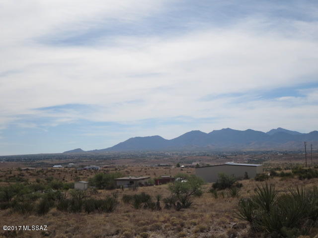4.40 acres with panoramic views of several mountain ranges. Electric and phone to lot line plus a share in a 5 way Well Share Agreement. Add a septic system and you are ready to plan for your new home. Manufactured Homes are allowed. Located approximately six miles from I-10 of which a few are on dirt road with a Road Maintenace Agreement in place.