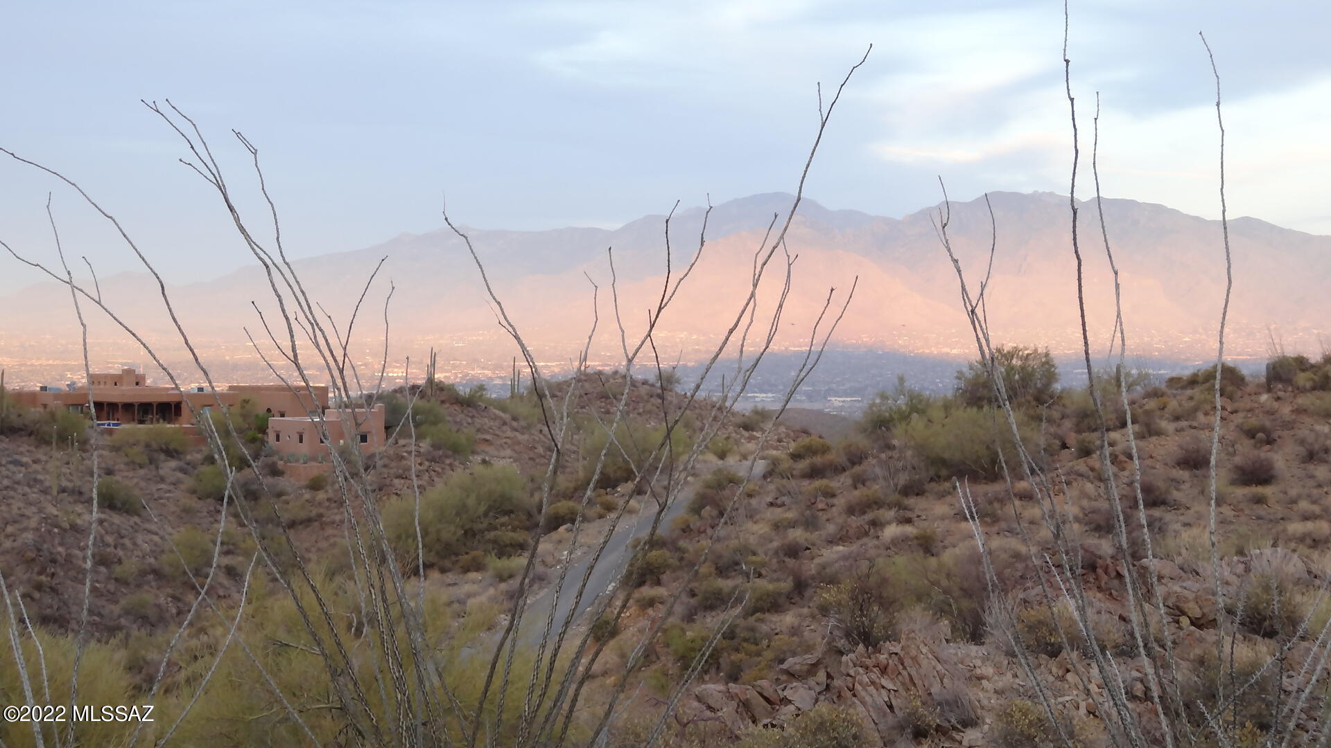 Beautiful westside property high above the city with views of multiple mountain ranges and an outstanding city view. Build your custom home with an exhilarating canyon view as a backdrop. Rural ambiance yet convenient to downtown, U of A, medical facilities, restaurants, and I-10. Approx 15 minutes to the freeway. In an area of custom homes. 3.5 acres of natural beauty.