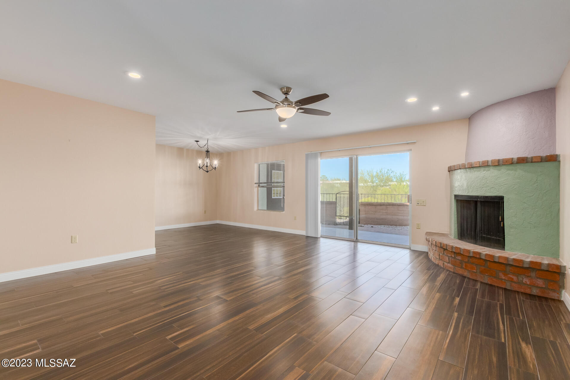 This remodeled 2-bed, 2-bath gem in Continental Vistas is now available! This end-unit townhouse is move-in ready & offers a 2-car garage, a private covered back porch, & a charming front courtyard that boasts breathtaking mountain views. Enjoy the serene setting without rear neighbors & appreciate the fresh interior/exterior paint, wood-look tile flooring, updated electrical systems, & a new water heater. The spacious living room, complete w/a Kiva fireplace, creates a warm & welcoming atmosphere. Perfect for socializing, the family room features a dry bar & skylights. The galley kitchen is equipped w/a tile backsplash, built-in appliances, & modern maple cabinets w/pull-out drawers for both convenience & style. Carpeted main suite includes ample mirrored closet space, direct backyard access, & a bathroom w/a large sink. Enhance your living experience w/a relaxing hot tub situated under a picturesque gazebo. Claim this jewel as your own!