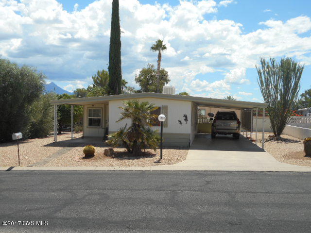 Great place to call your own. Light and bright interior. Split floor plan. Redone Kitchen and bathrooms. Laminate flooring in living Room with glass sliders opening into finished Arizona Room with A/C cooling (not included in square footage). New Evap cooling November 2013, Hot Water Heater 2010, Roof Coated approx. 3 years ago. Large workshop/storage room. Easy care yard with patio off 2 car carport. Furnishings left in home will convey Close of Escrow to Buyers at no monetary value. HOA Fee ($55.00 month), Includes clubhouse, heated pool, spa, library, meeting room, exercise room, pool table, horseshoe courts, shuffleboard, ceramics, crafts, card games, bingo,weekly trash pick up and road maintenance. Close to shopping, restaurants, golf courses, places of worship and medical facilities.