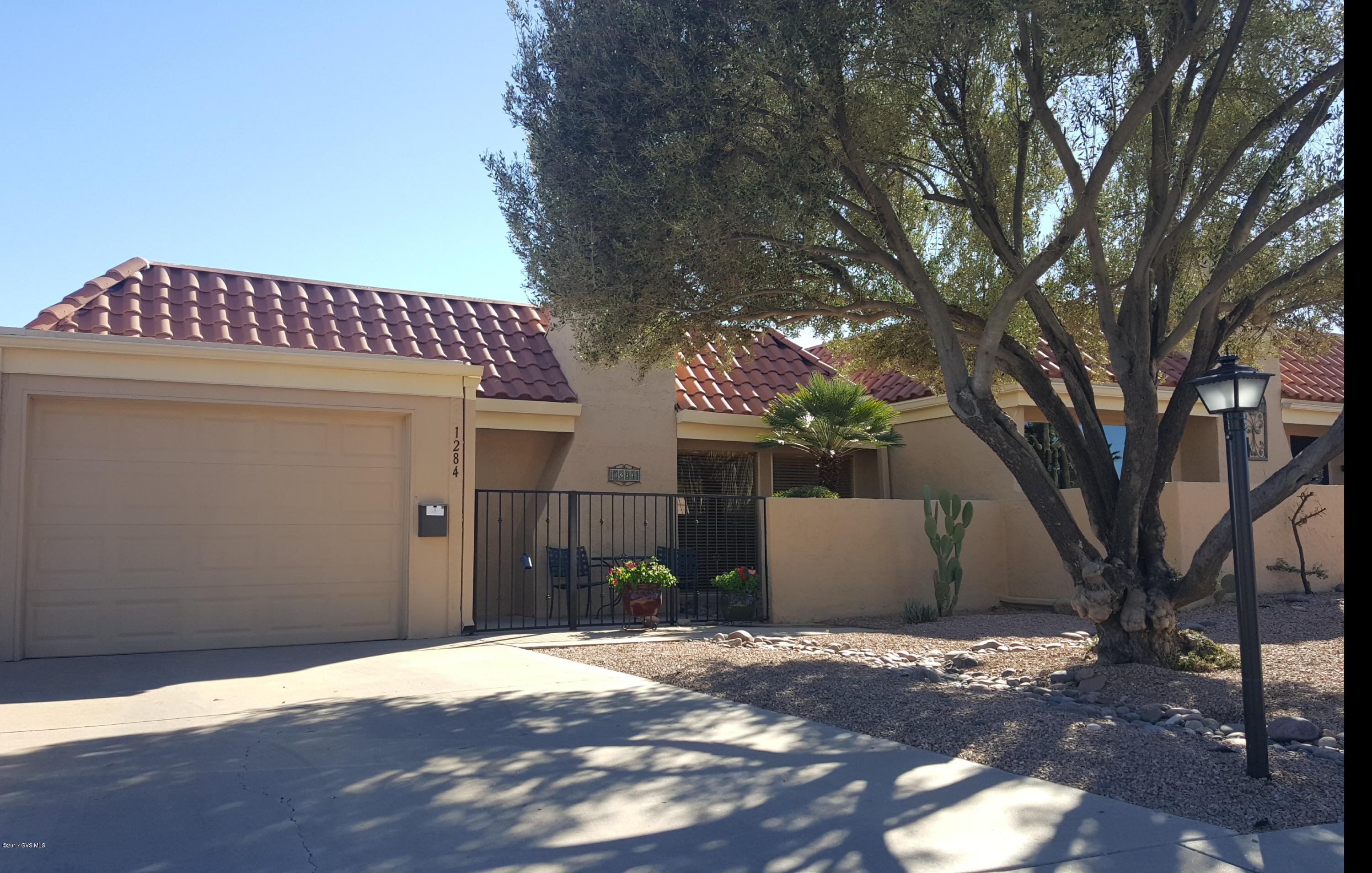 Exceptional remodel with an open kitchen floor plan and beautiful golf course and mountain view. Features a mesquite bar counter top, newer self closing cabinetry ,flooring, wood burning fireplace, executive height vanities, new sinks fixtures and toilets in this 2 bedroom ,2 bath casita with a built in office. Gas Pack replaced 2013 GV Heating & Cooling contract. Crawl space storage in attic with pull down staircase.