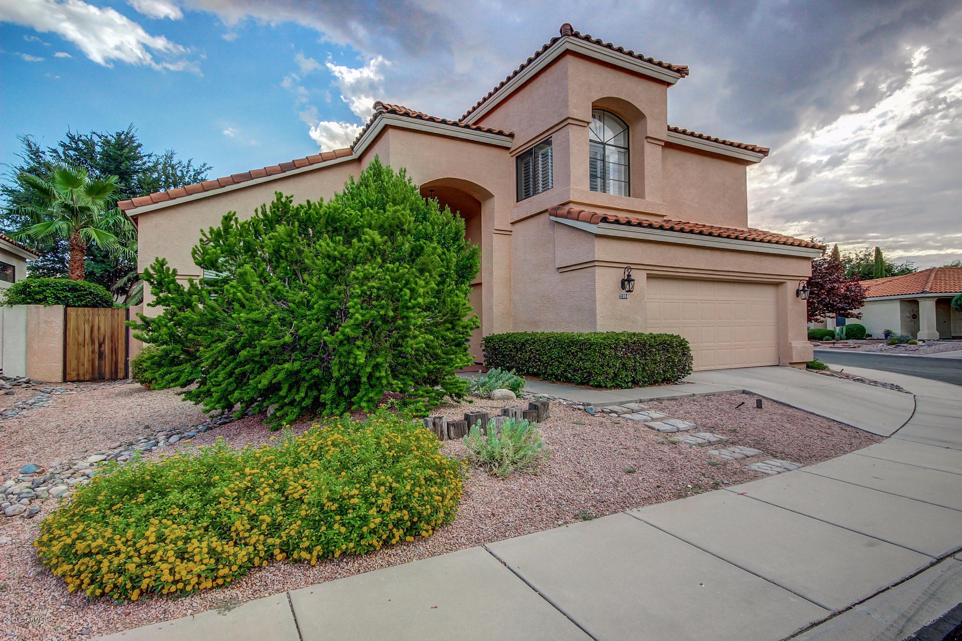 Discriminating buyer look no further this contemporary home has amazing updates and is move in ready for you.  Vaulted ceilings, custom kitchen with large island, solid wood cabinets, gorgeous granite counter tops, beautiful glass back splash and an entertainers delight. First floor has one full bedroom/office, second floor has gorgeous custom bathrooms with granite counters, amazing tile and plenty of space! Plantation shutters thru out and pride of ownership! Delightful backyard with newly surfaced pool, waterfall, built in BBQ, plus outdoor bathroom with shower.  Mature trees make this over sized lot the pride of the neighborhood.