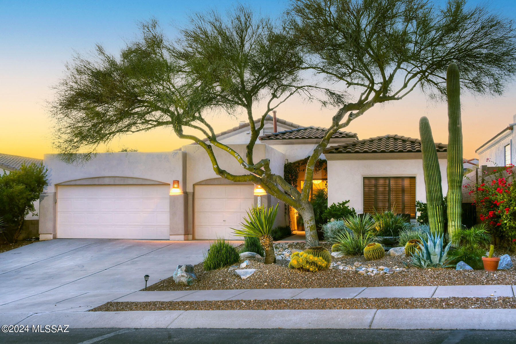 Welcome to your dream home in the heart of Sabino Springs! This beautifully updated 4-bedroom, 2.5-bathroom residence is a perfect blend of luxury and comfort. As you step through the front door, you'll immediately notice the open and inviting floor plan.
The spacious living room is adorned with a cozy gas fireplace, creating a warm and welcoming atmosphere. Plantation shutters throughout the home add a touch of elegance while allowing natural light to fill the space. The split bedroom plan ensures privacy, with the master bedroom featuring a generous walk-in closet and an adjoining bath for added convenience.Prepare to be amazed by the stunningly renovated kitchen, a true chef's delight! Boasting 42'' custom Alder Cabinets, an island with a gorgeous Walnut top and a large breakfast bar, this kitchen is perfect for entertaining friends and family. The thoughtful design and high-end finishes make it a focal point of the home.Step through the oversized new patio doors and discover the oasis that awaits you in the backyard. Immerse yourself in the lush landscaping, featuring new drip irrigation, and an abundance of beautiful plants and trees. Cool off in the sparkling pool and spa, both equipped with a new heater and filter system. Take in the breathtaking Catalina Mountain views from your own private paradise that backs to a serene desert arroyo.

The worry of a roof is a thing of the past, as it was replaced in 2023, ensuring your peace of mind. Additional perks include a 3-car garage with extra storage space, providing both convenience and functionality. Experience the lifestyle of gated Sabino Springs, where community amenities include a pool, spa, exercise facility, and sidewalks throughout the subdivision. Take advantage of the public golf course and restaurant, just steps away from your front door.

Don't miss the opportunity to make this exquisite property your new home - where luxury, comfort, and stunning views come together in perfect harmony. Schedule a showing today and envision your future in this Sabino Springs masterpiece!