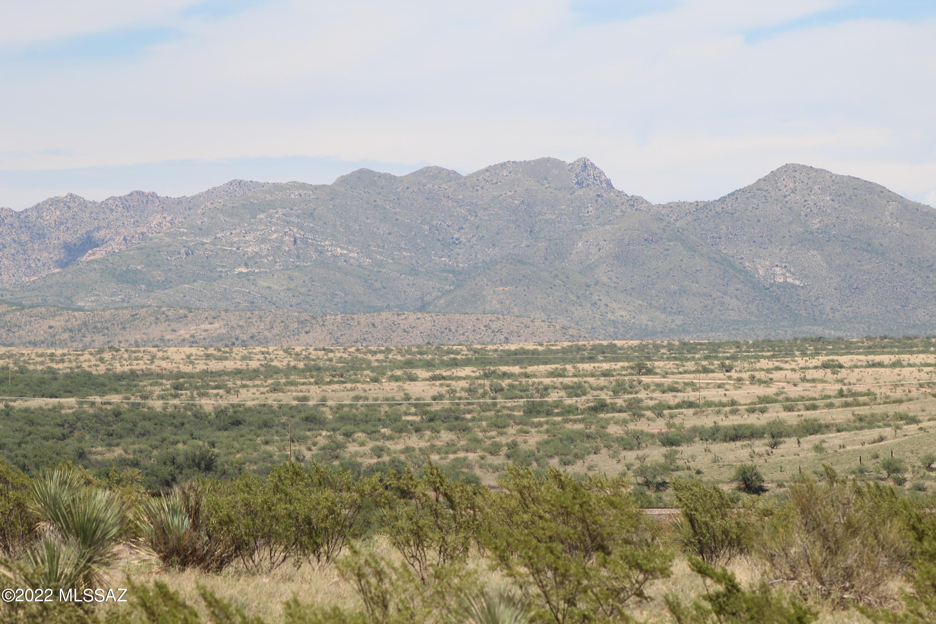 Beautiful parcel with incredible views with Arizona mountains and the famous Mescal Movie Set. Take advantage of wide open spaces and build your dream homestead. 8 acres allows you room to grow and to play. Utilities nearby at lot line and parcel on 5/8 well shares. Easy commute to Tucson while still being in the country.