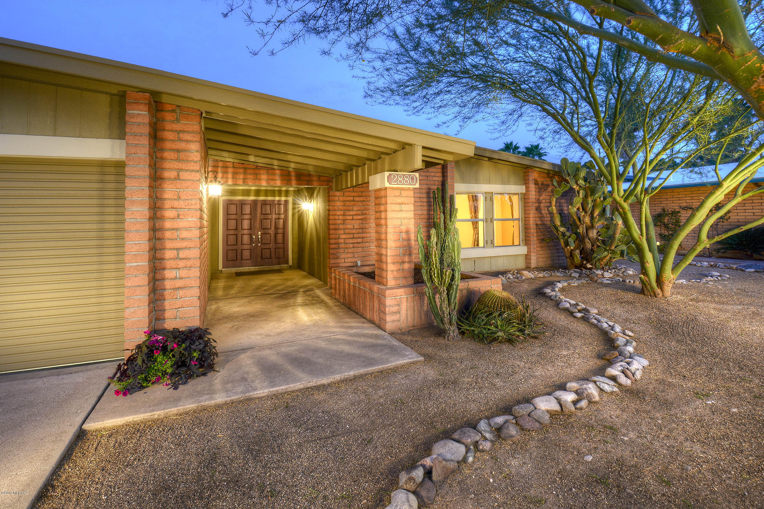WONDERFUL COMBINATION OF CLASSIC TUCSON RANCH ARCHITECTURE W/TWIST OF MODERN ELEMENTS! TASTEFULLY REMODELED- UPDATED W/CONTEMP FLAVOR & DESIGN!INCREDIBLE HM FOR THE PRICE- LOADED W/CUSTOM APPOINTMENTS!GORGEOUS KIT HAS EUROPEAN FEEL...RICH MAPLE CABINETRY ACCENTED W/GLASS DISPLAY DOORS, SS HARDWARE,CUSTOM BUILT PANTRY- TONS OF DRAWERS, MOSAIC BACKSPLASH, RAISED BKFAST BAR, CAFE DINING AREA, SLIDERS TO SIDE PATIO, ALL SS APPLIC INCL- EVEN DOUBLE OVENS!GATHERING RM OFFERS- REAL WOOD BURNING KIVA FP, STAGGERED TILE,ACCENT PAINT, SOARING CEILINGS W/SLIDERS TO BKYD!NO CARPET!TOTALLY REMODELED BATHS- FEELS LIKE POTTERY BARN AD! VERY COOL DESIGN- GUEST BA W/DUAL SINKS,UNIQUE ROUND MIRRORS & MODERN LIGHTING/HARDWARE! MSTR RETREAT- SPA FEEL-FURNITURE STYLE VANITIES,WALK IN SHOWER/TUB!GREAT BKYD TOO!