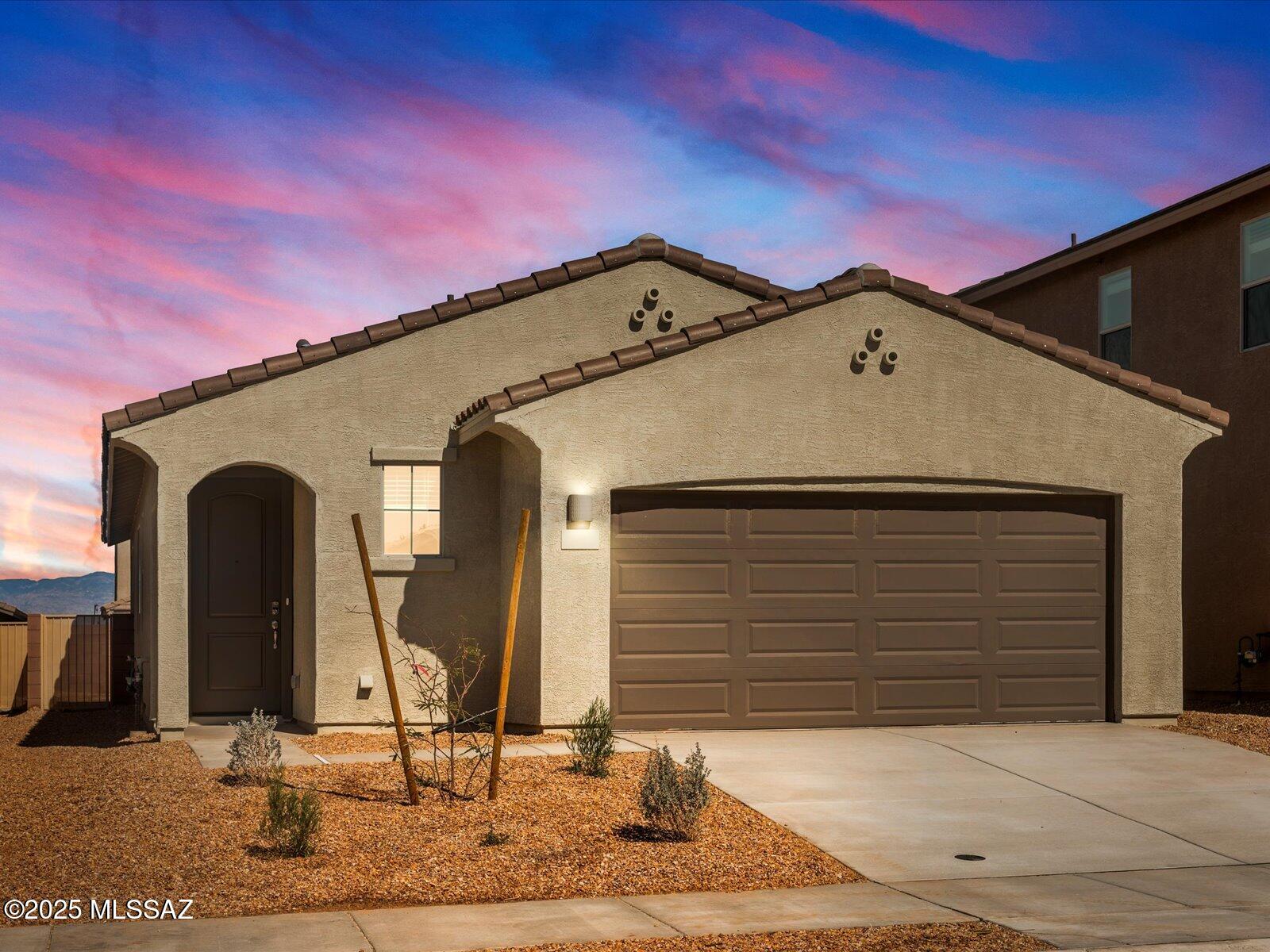 There is plenty of storage space in this 3 bedroom 2 bath home. The pantry in the kitchen allows plenty of storage for all of your needs and closets for linens and coats. Umber cabinets with dusty white and gray granite countertops, stone-look tile flooring and warm beige carpet. Set against the stunning backdrop of the Rincon Mountains, this community is located within the highly desirable Vail School District and offers easy access to the 1-10 and major employment centers. Each of our homes is built with innovative,
energy-efficient features designed to help you enjoy more savings, better health, real comfort and peace of mind.