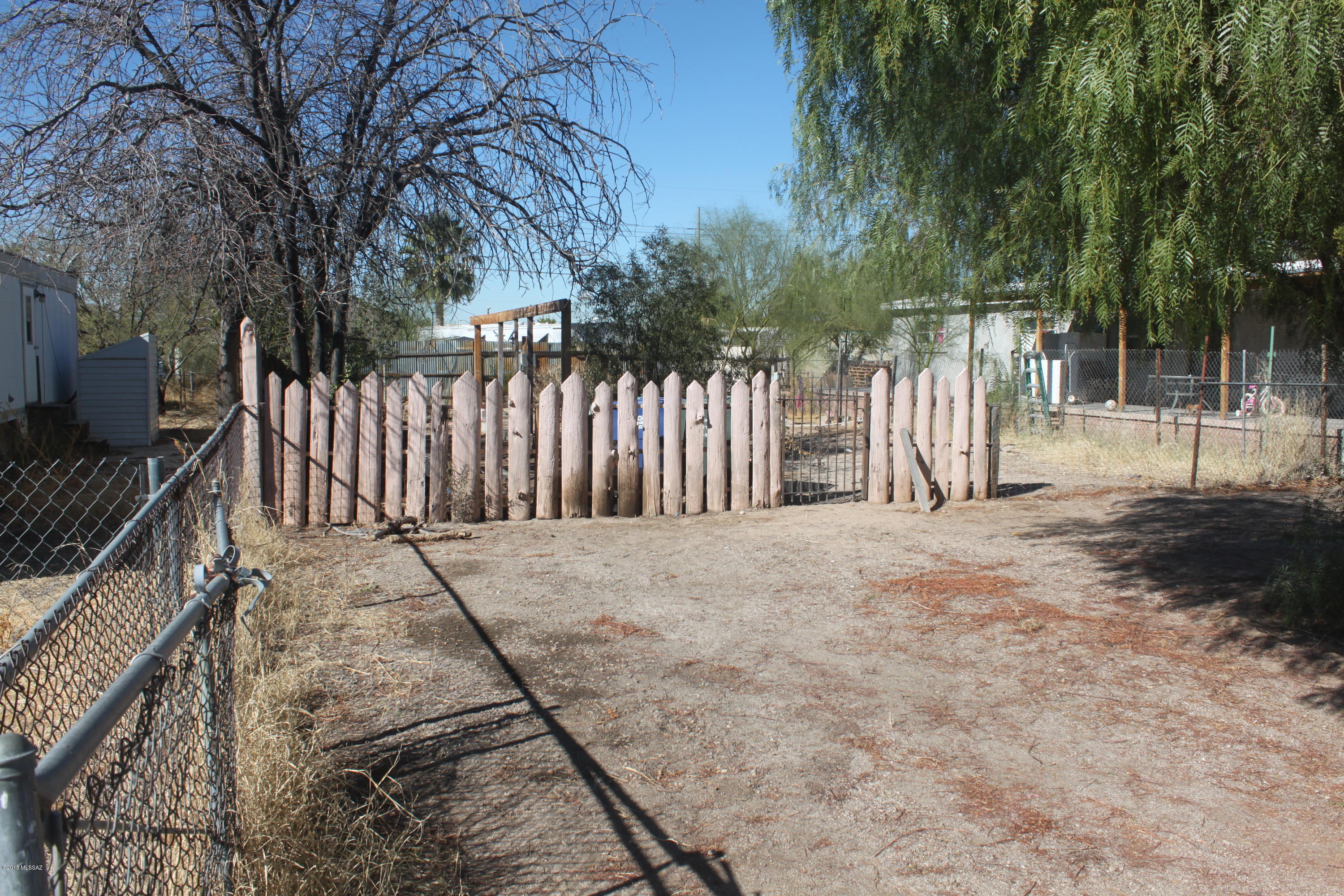 Rare lot zoned MU. Bring your mobile home, RV or business. Utility hook-ups already on the lot. Near Tucson Mall, shopping and restaurants. Seller will consider Owner Financing.