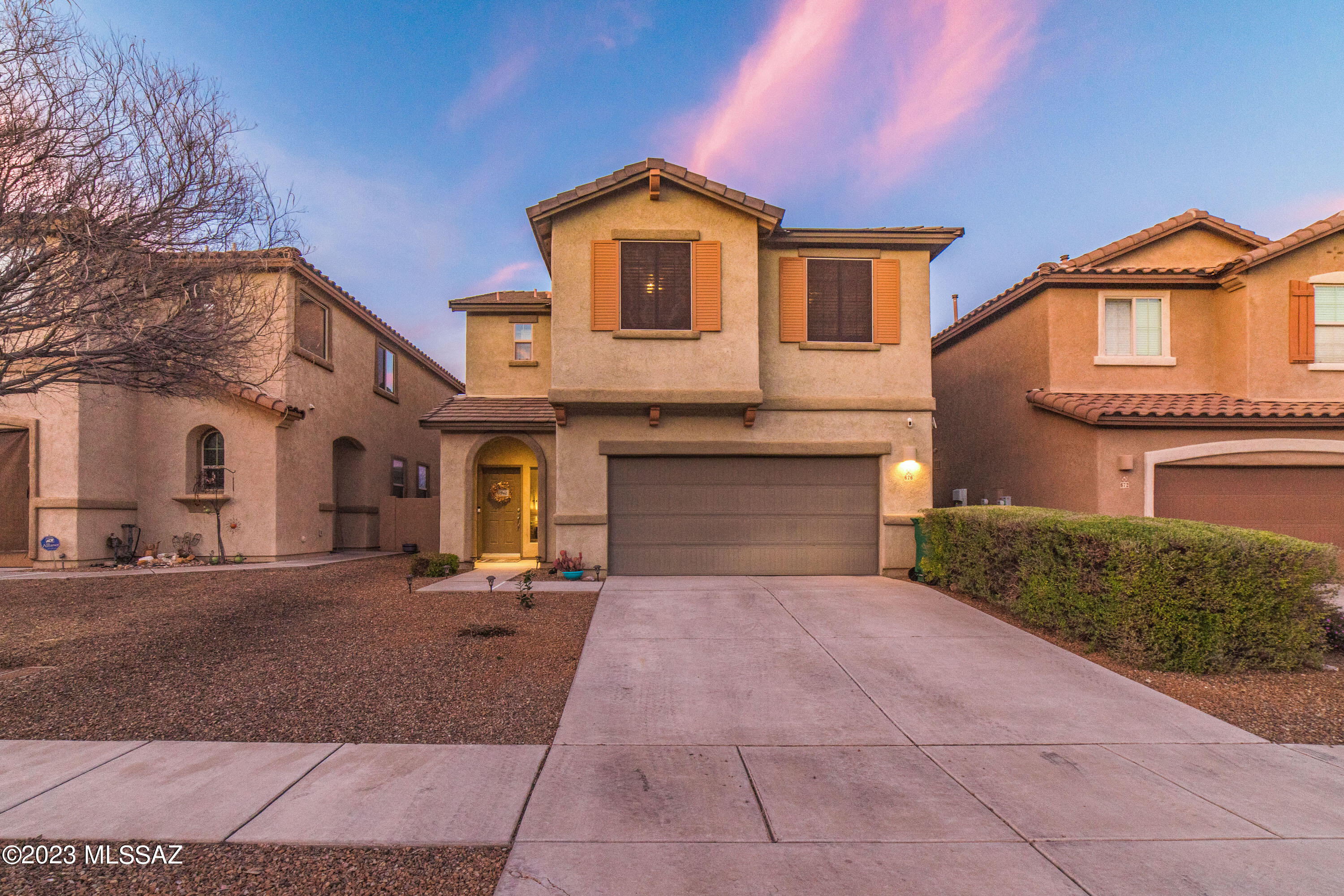 SELLER OFFERING A 2.5% VA LOAN ASSUMPTION!  This well developed community also known as ''Rancho'' welcomes you! This two story home features 3 bedrooms, 2.5 baths, tile and carpet throughout. Upstairs you will find all 3 bedrooms, 2 baths and a cozy loft. Laundry room is conveniently located upstairs! Downstairs you'll find an open floor concept as well as a half bath and ''Harry Potter Closet''. Home includes a water softener, windows screens for the hot summers, custom tile backsplash, granite countertops and movable kitchen island. This custom backyard awaits your personal touch which features artificial grass and pavers throughout. Lucky for you- no rear facing neighbors which enables clear views of the Catalina Mountains! Take advantage of what the HOA has to offer: Olympic size pool, basketball courts, volleyball courts, gym, hot tub, splash pad, 17 mile trails, clubhouse, and a large lake in the heart of Rancho Sahuarita! Highway access and shopping centers just minutes away! Make this home yours in the exceptional master planned community- schedule a showing today!