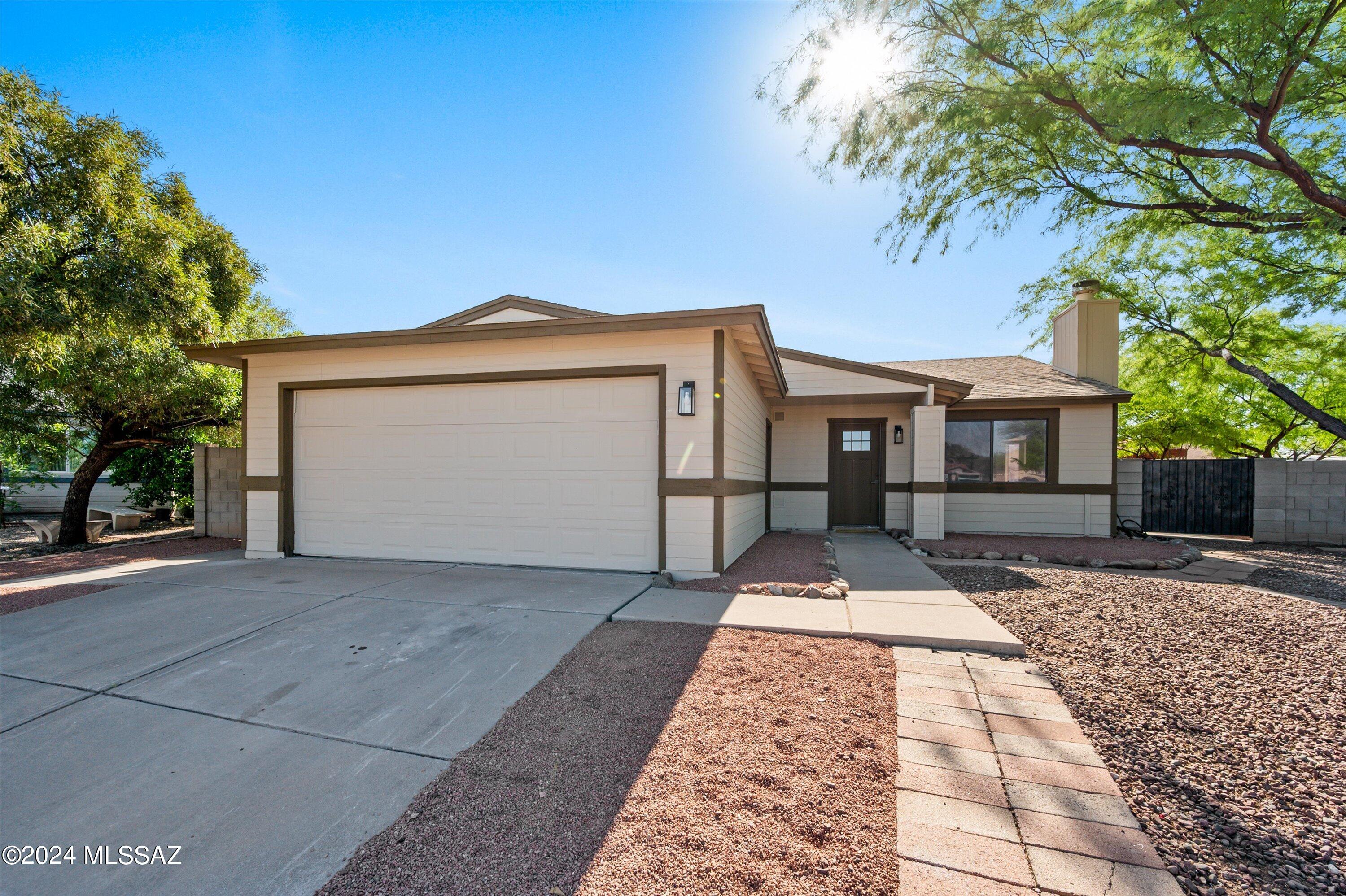 This stunning property is full of desirable features that promise comfortable living and substantial savings. A standout feature of this property is the included SOLAR PANELS FULLY PAID, no more high electric bills, making this home cost-effective. Prime area, this home offers convenience and accessibility to amenities and schools. Impressive  complete remodel, which includes a brand-new AC system, elegant laminate flooring, complemented by fresh interior and exterior paint, creating a modern and inviting atmosphere. The heart of the home, the kitchen, shines with new granite countertops, providing both functionality and style. Every detail has been meticulously attended to, from the new light fixtures to new faucets and hardware, enhancing the overall appeal of the home. Renovations extend beyond the interior, with new tile adding sophistication to bathrooms and landscaping enhancing the curb appeal.bDon't miss out on the opportunity to make this meticulously upgraded home yours. Schedule a showing today and experience the epitome of modern living!