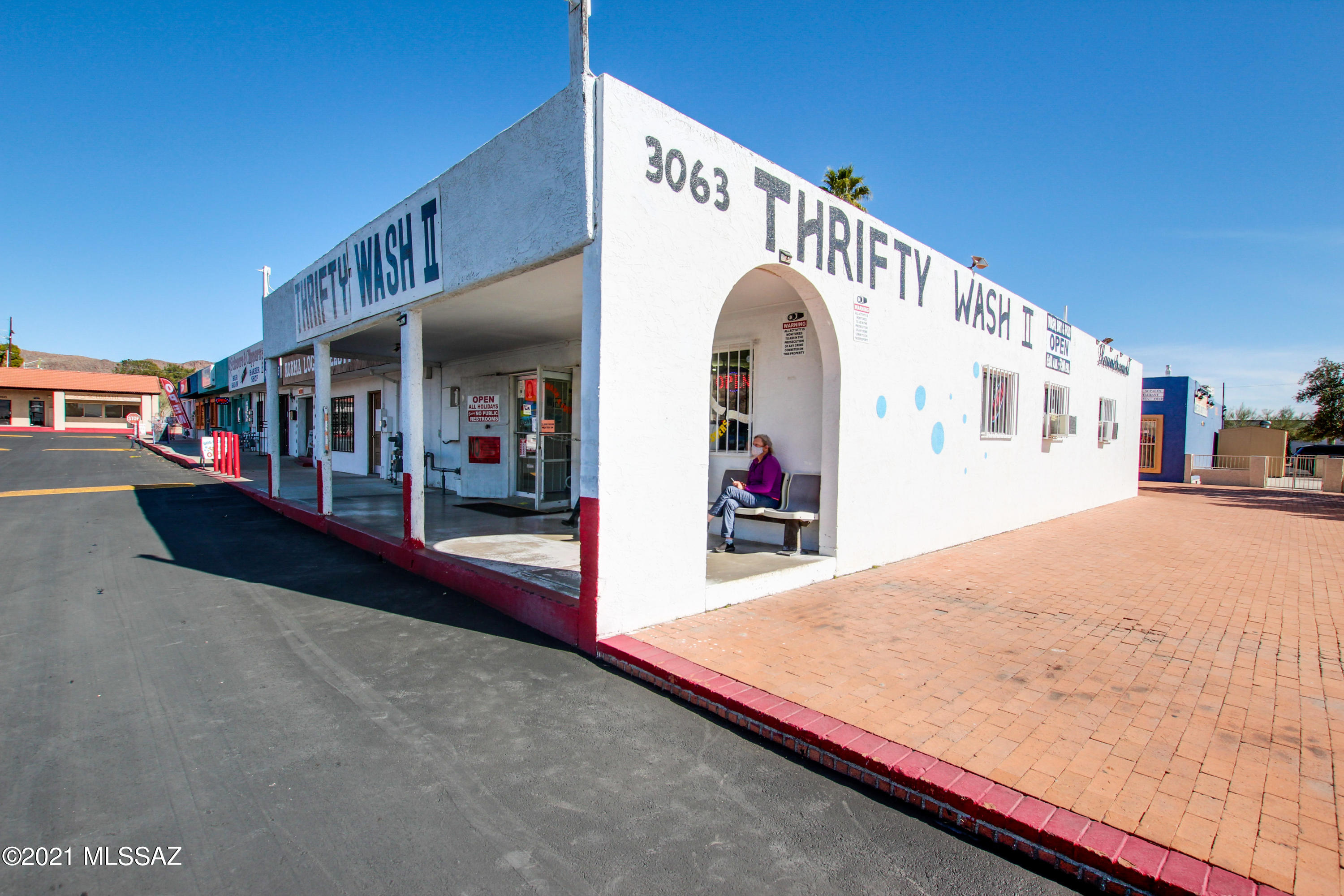 The Thrifty wash II is a Coin operated laundry mat. The trade fixtures do convey. (22 washers, 18 dryers, 3 coin machines, 3 folding tables and 2 supply dispensers.) The property is clean and ready for new owners. 3063 S. Kinney Road is close to highway so lots of traffic and easy access to get anywhere in town. Located in a commercial strip with tons of parking in shopping center. It is also a corner lot with lots of foot traffic. Schedule a showing with John ( Listing agent) with an hours notice.