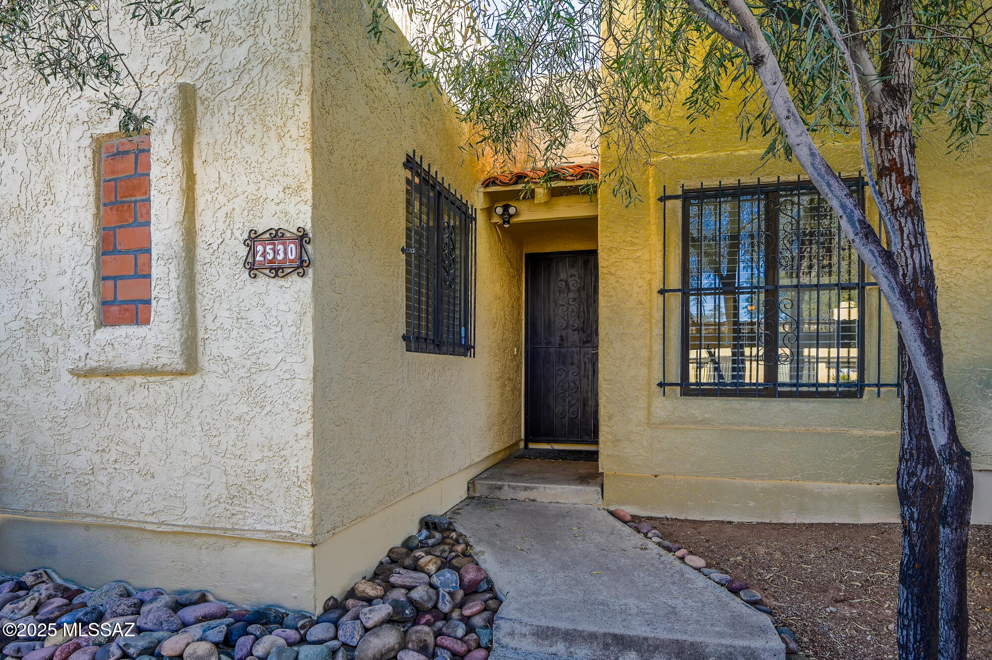 Beautifully Remodeled 2 Bed, 2 Bath Home - Move-In Ready! Step into this completely remodeled 2-bedroom, 2-bathroom home that combines modern upgrades with timeless style. Every inch has been thoughtfully updated, featuring brand-new tile flooring throughout, fresh interior and exterior paint, and stylish new doors and trim. The kitchen boasts custom alder wood cabinets, stunning granite countertops, and all-new faucets, creating a space that's as functional as it is beautiful. Upgraded fans and lighting fixtures enhance the ambiance, while a new A/C unit ensures year-round comfort. This home is perfectly located near shopping centers, The University of Arizona, and Pima Community College—making it ideal for students, professionals, or anyone looking for convenience and comfort