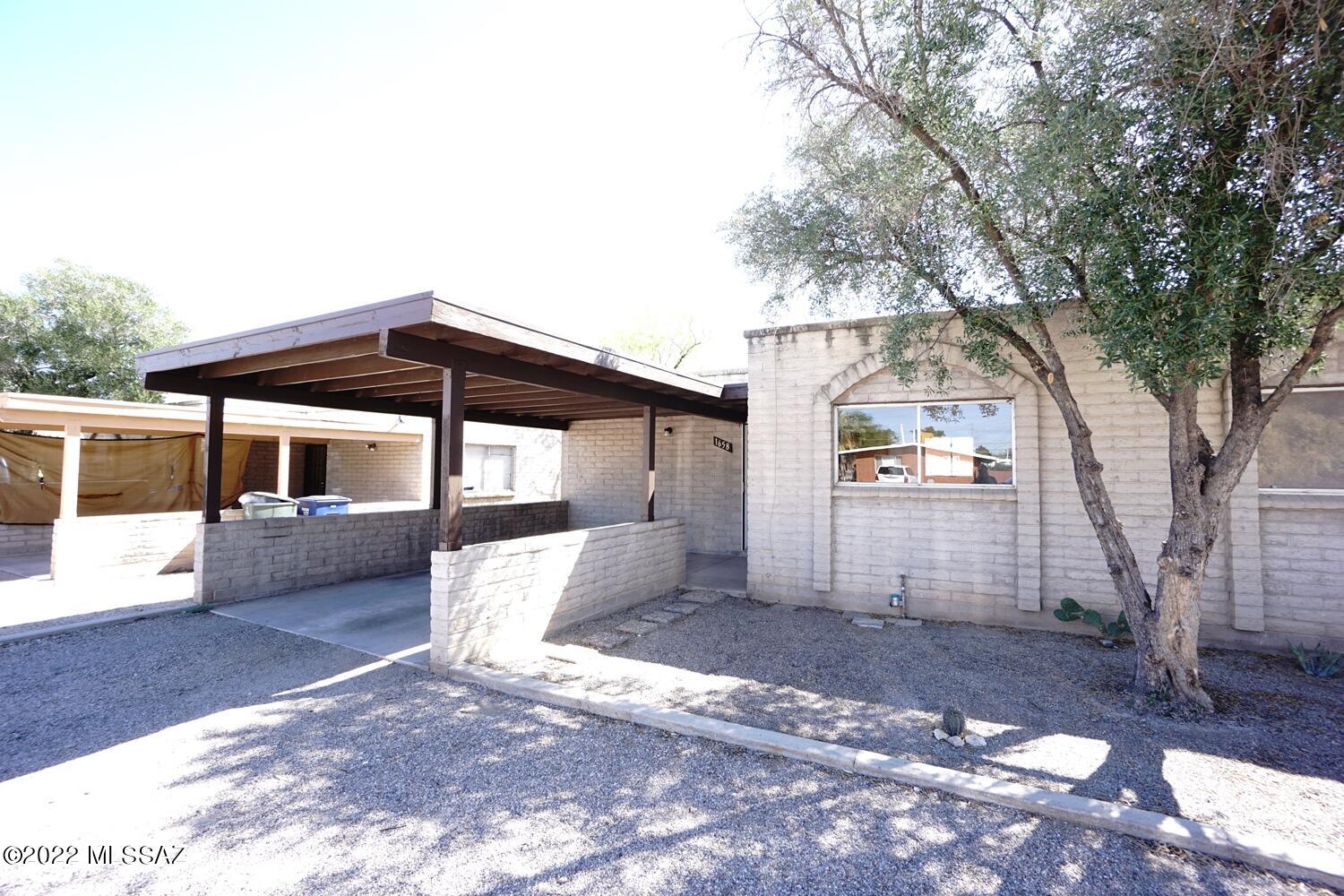 GORGEOUS JUST FULLY REPAINTED HOME.  ALL TILE INTERIOR.  LARGE ENCLOSED BACKYARD.  VERY PRIVATE SETTING.  HIGH EFFICIENCY NEW A/C SYSTEM.