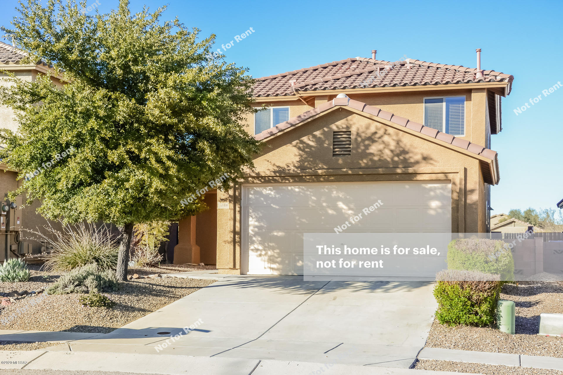 Built in 2008, this Green Valley two-story home offers a loft, a master walk-in closet, a covered back patio, and a two-car garage.