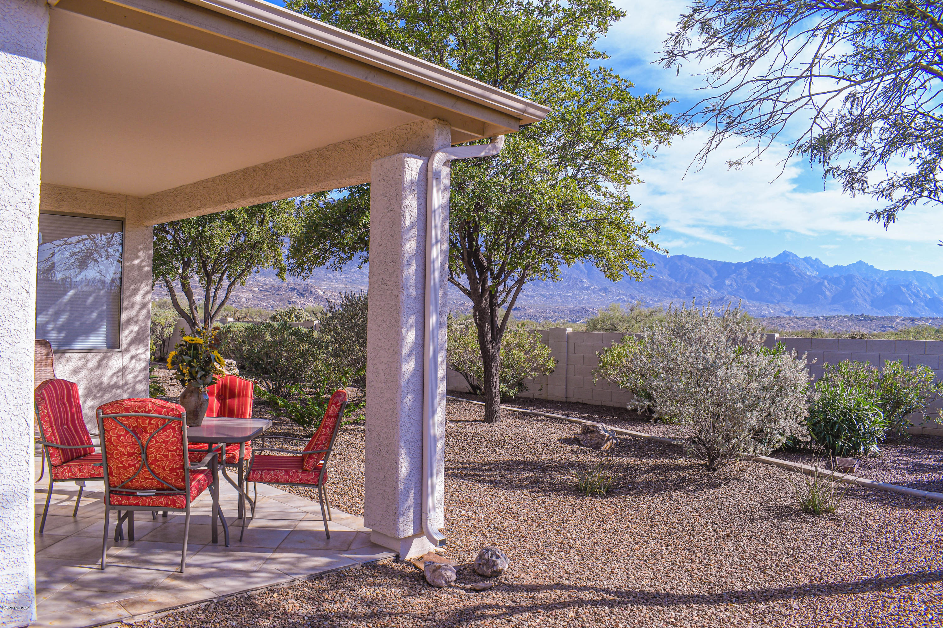 Fantastic Mountain and Desert Views from the back patio! This home has a very large open space to the next Villa. This popular Naples Villa offers a split bedroom plan, den, great room and front room that can be used for many purposes. The kitchen is open to the great room. Beautiful tile floors throughout. Kitchen has maple cabinets, large built-in pantry and engineered stone countertops. Enjoy the mountain and desert views from the great room's large windows & the master bedroom. The Villa HOA takes care of the exterior and landscape maintenance giving you more freedom to enjoy Saddlebrooke. Come & enjoy the endless amenities that Saddlebrooke has to offer. Furnishings can be available on a separate bill of sale.