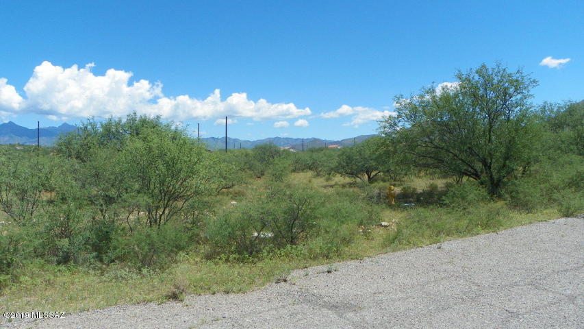 Nice residential lot on paved road with Electric at the street. Water appears to be at the street and this lot is also served by sewer so no percolation test or septic system expense required to build on this lot.  Next door lot also for sale for the same price.