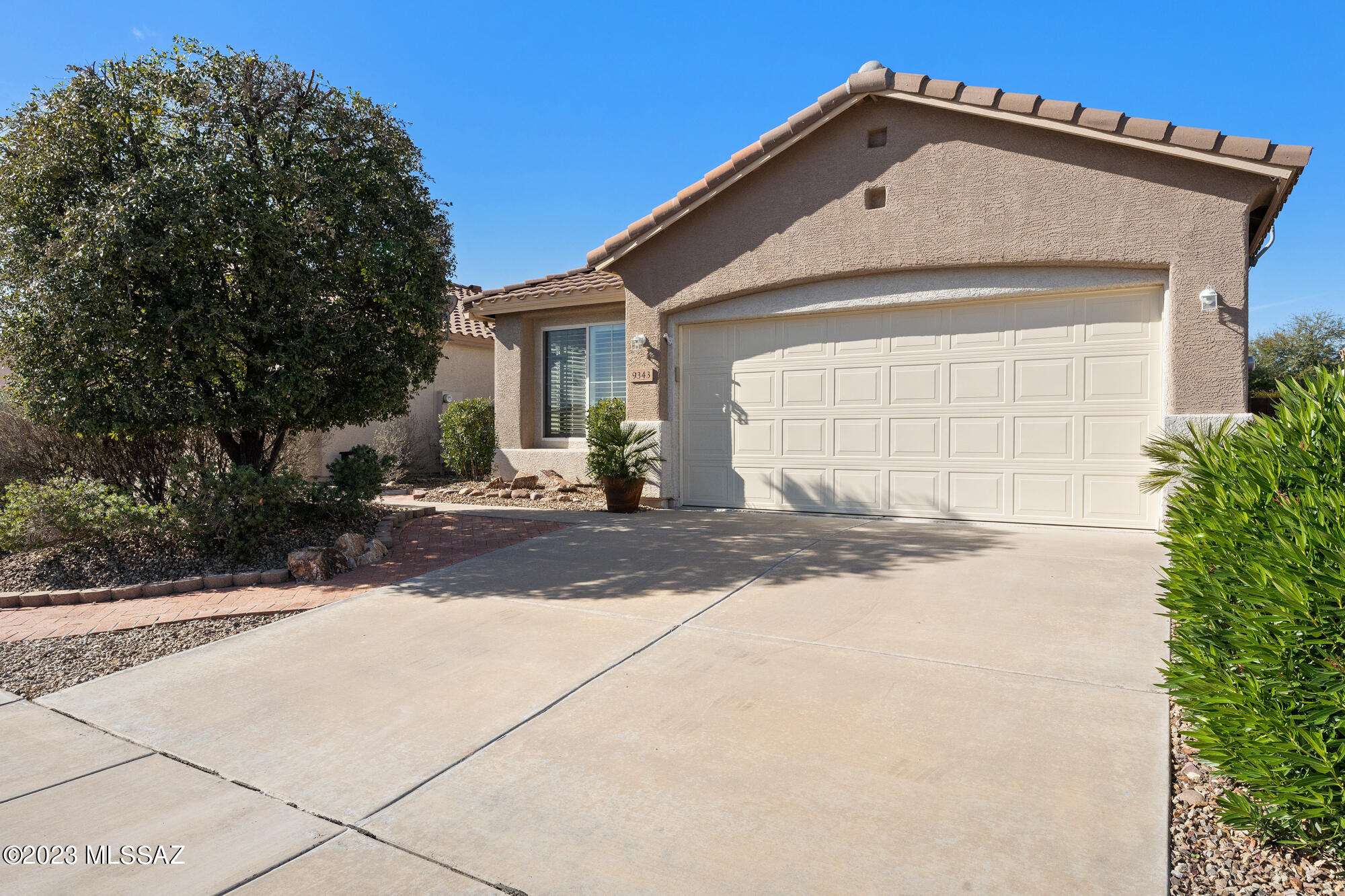 Located in the N Tucson Mtn Foothills in the 55+ Community of Sunflower, this Santa Rita model hosts 1598 SF with 2 BDRMS, Den/Office, Great Room, Dining Room, Laundry Rm & Brfst Nook. Vaulted ceilings adorn the interior. Completely remodeled Gourmet KT with custom-wood cabinetry, granite, gas cook-top, oven, microwave & a plethora of storage. Many areas with  plantation shutters. Split-bdrm floorplan gives your guests the privacy they desire.  Ceramic tile & wood laminate thruout. Primary Bdrm has a walk-in closet & en suite with Garden tub & separate shower. Guest bath is by the den & Guest bdrm.  Add'l updates include: HVAC-Feb '19, HWH-Apr '18, Water Softener-Dec '18, Drip Lines Jul '20, Roof underlayment-Jan '22. Beautifully landscaped & relaxing backyard w/pond, patio & views.