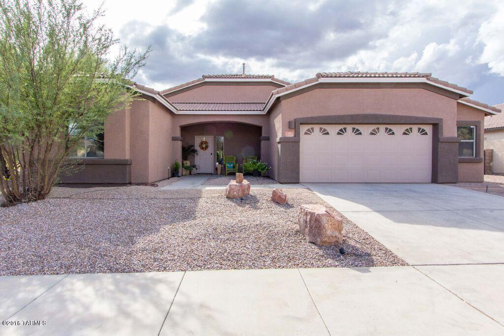 The property is awesome.  Salt water pool in the luscious backyard that backs up to a grassy park area.  Just around the corner is a brand new school that plans to open in the fall.  The spacious 3 bedroom 2 full bathroom house is in incredibly well kept shape and boasts large ceramic tile flooring and plenty of cabinet space in the kitchen with a breakfast bar to entertain or casual family eating!