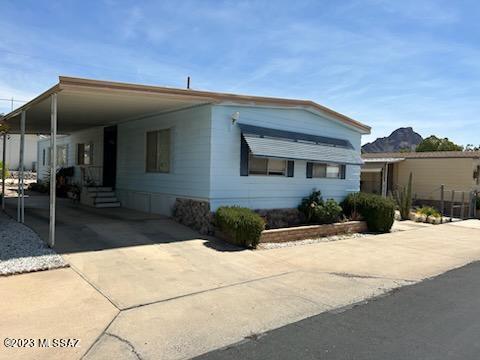 This beautiful 55 plus community is a great place to call home. It has mountain views, a pool, golf course, club house, stores, and restaurants very close by and even its own radio station. Most everything you need is just a golf cart ride away. Casino Del Sol is just about 10 minutes from the wonderful Tucson Estates that you will now be calling home. The home is a 4-bedroom 2- bath. Perfect size for the family to visit. Heat pack was replaced in 2019.